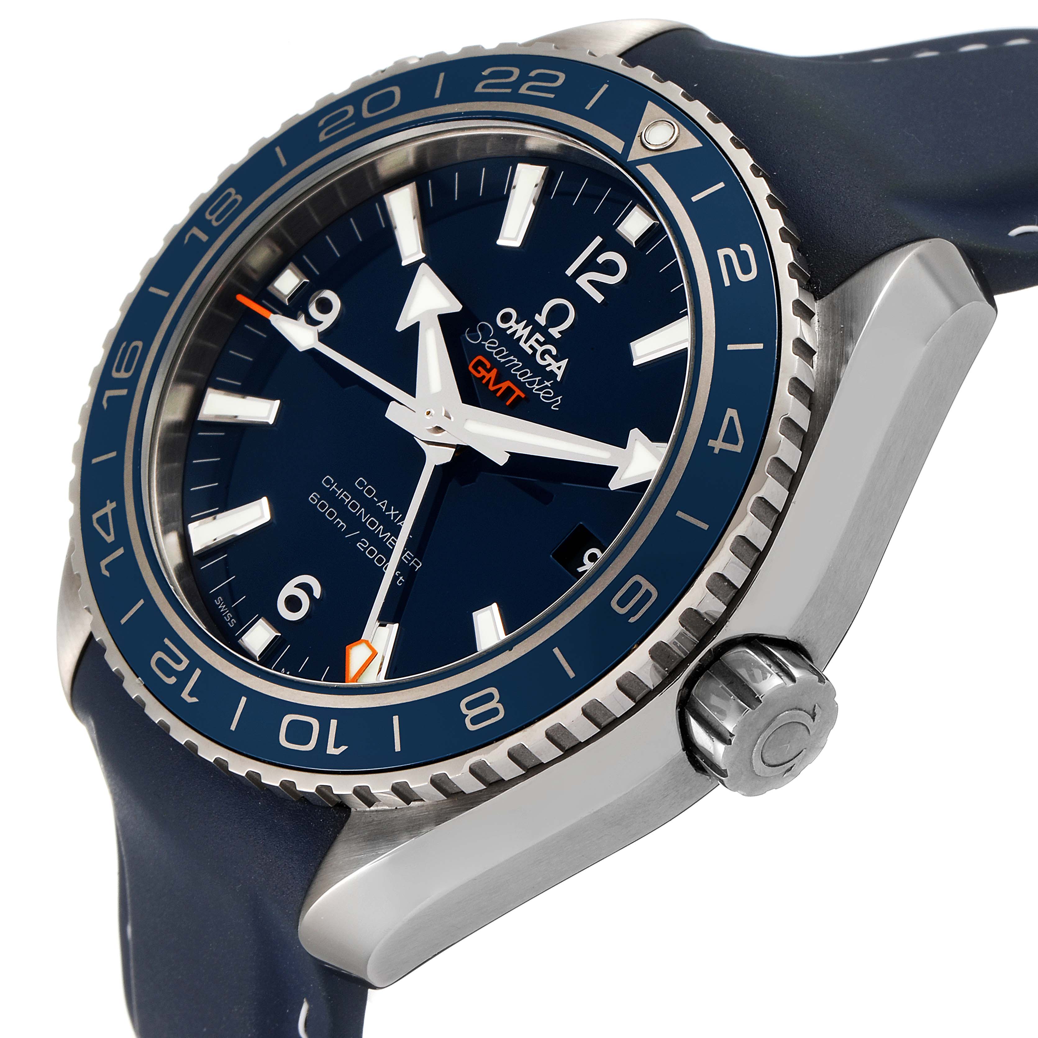 The image shows an angled close-up of the Omega Seamaster Planet Ocean GMT watch, highlighting the bezel, crown, and part of the strap.