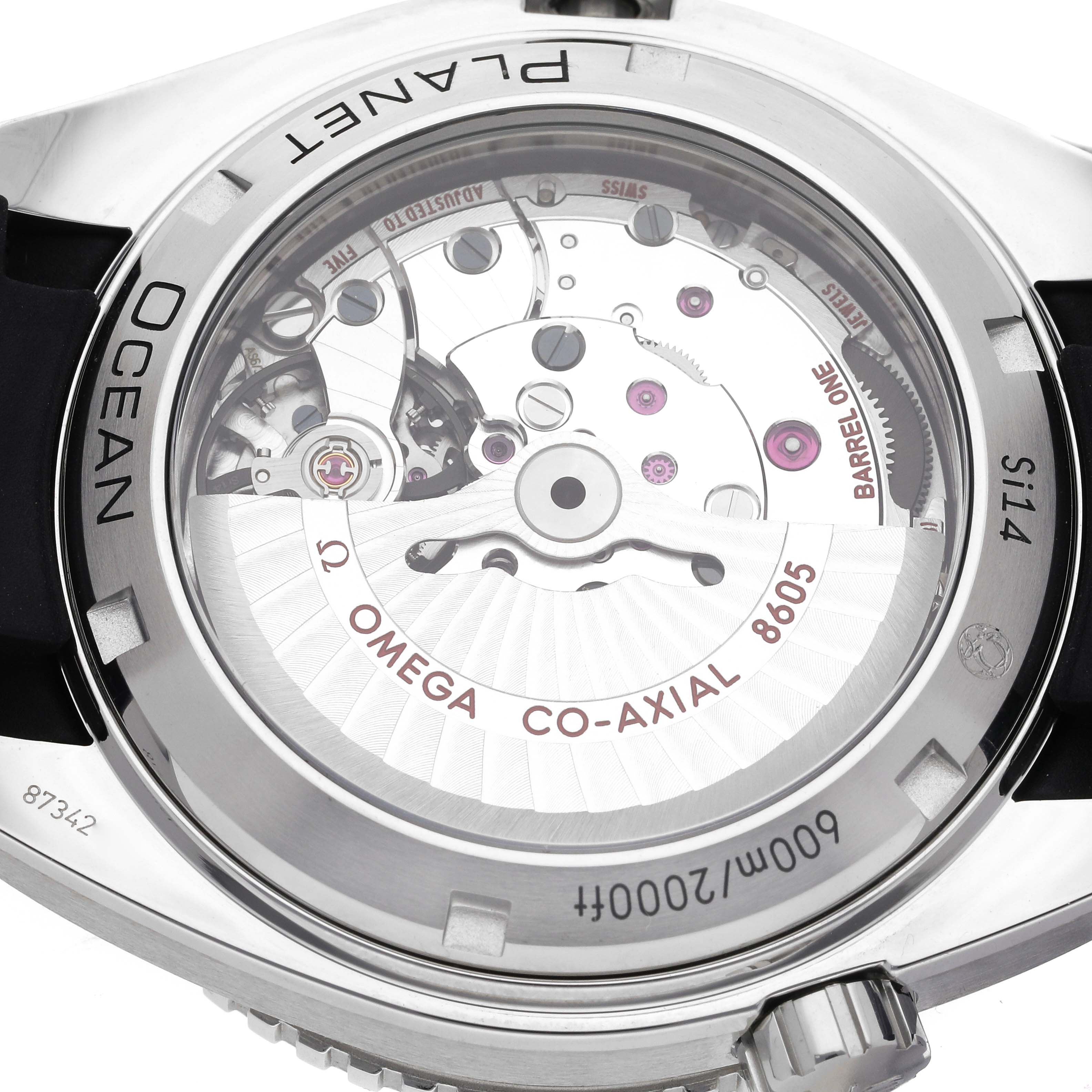 This image shows the back case and internal movement of the Omega Seamaster watch model at a close-up angle.