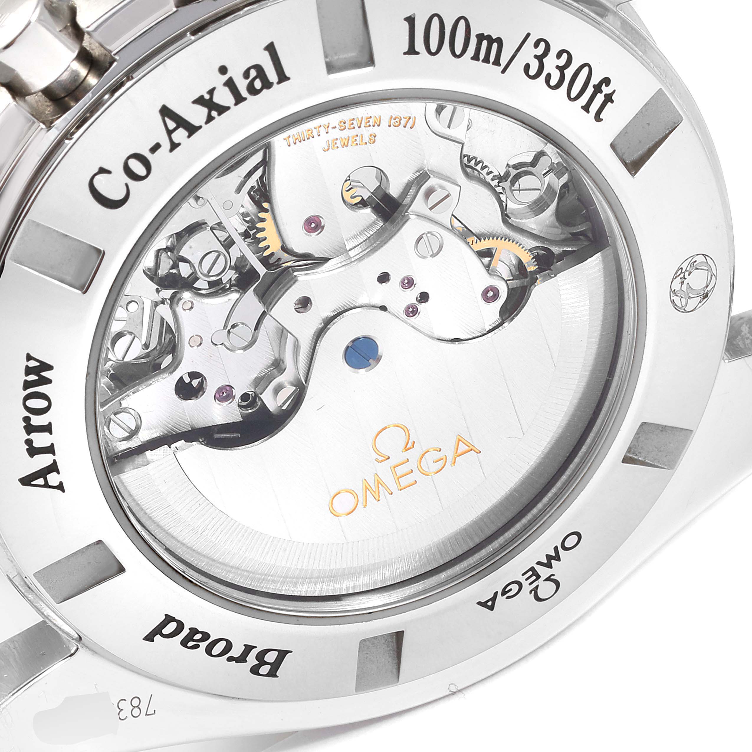 The image shows the back view of the Omega Speedmaster 321.13.44.50.02.001 Men's Stainless Steel Silver Dial 321.13.44.50.02.001 Men's Stainless Steel Silver Dial, highlighting its Co-Axial movement and internal mechanisms.