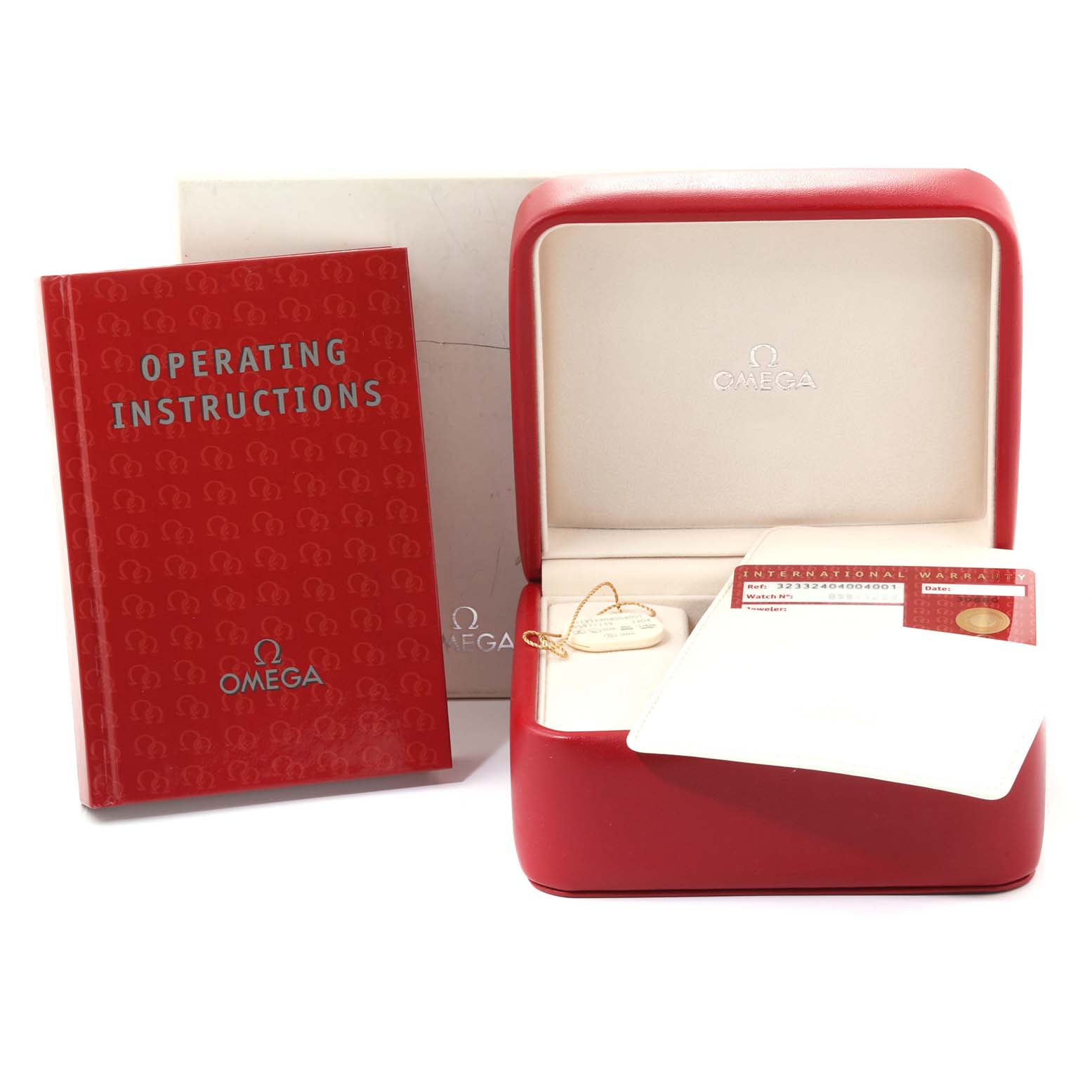 The image shows an Omega Speedmaster 323.32.40.40.04.001 Men's Stainless Steel White Dial 323.32.40.40.04.001 Men's Stainless Steel White Dial watch box, operating instructions, and warranty cards.