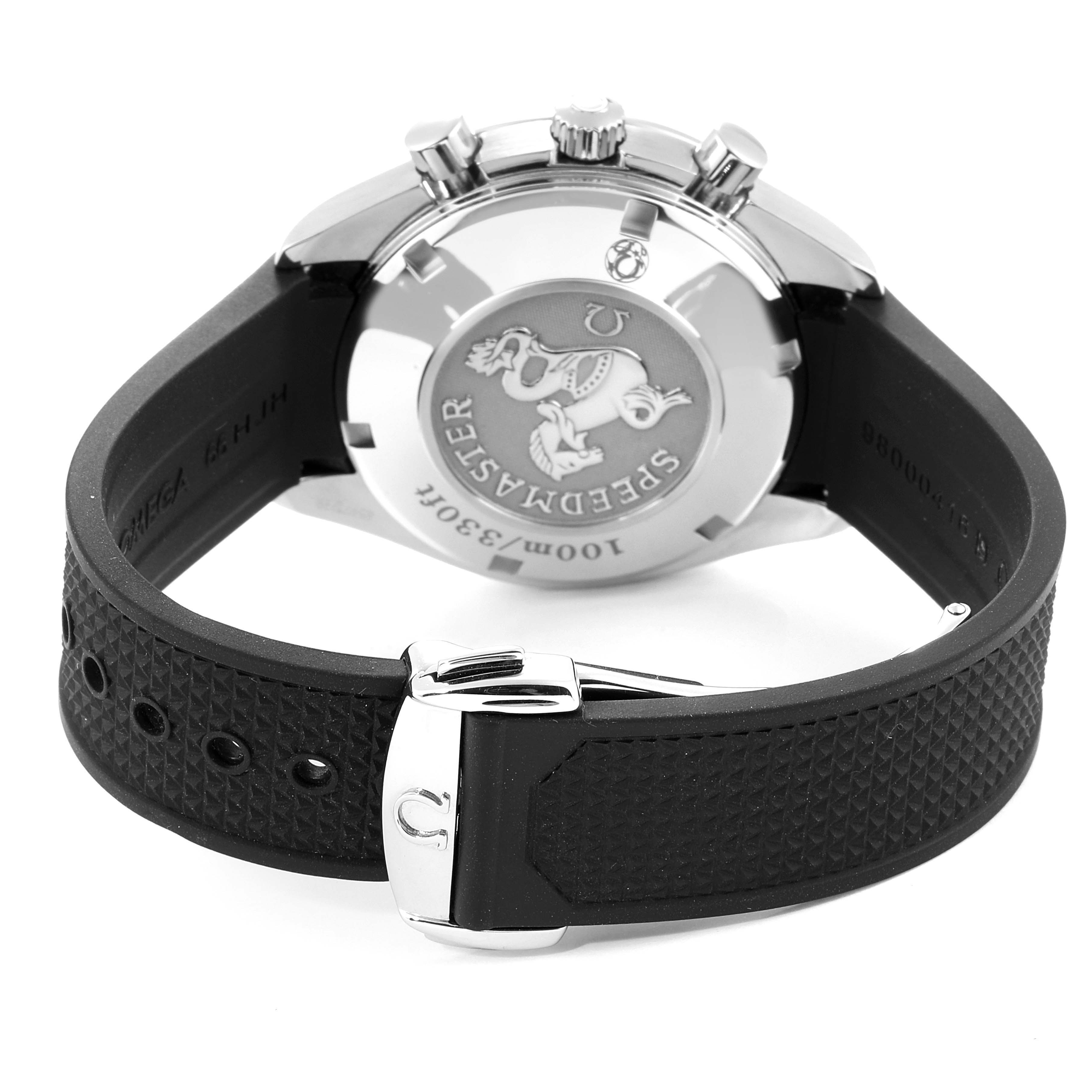 This image shows the back case and strap of an Omega Speedmaster 323.32.40.40.04.001 Men's Stainless Steel White Dial 323.32.40.40.04.001 Men's Stainless Steel White Dial watch, featuring a detailed emblem and deployment clasp.