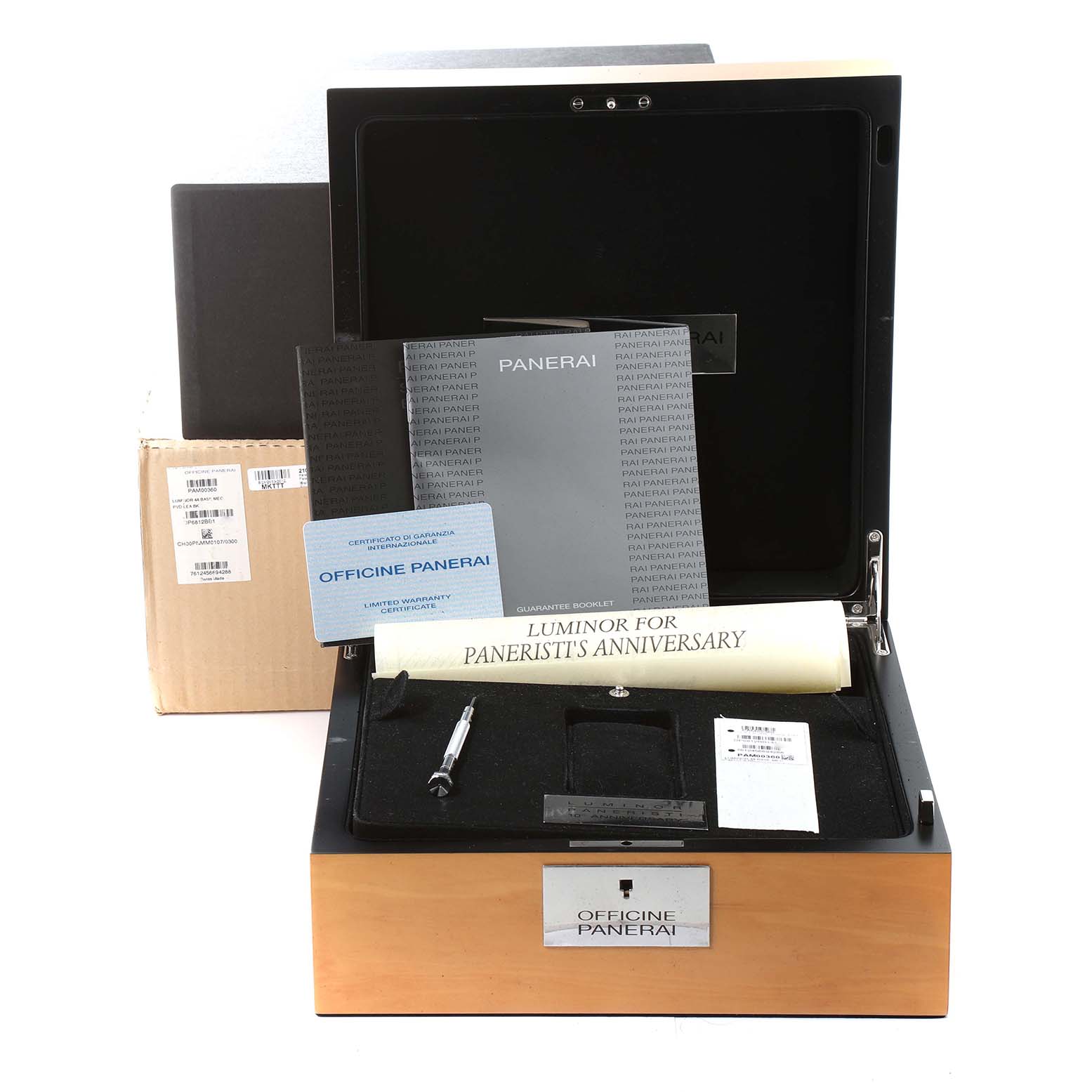 The image shows an open box of a Panerai Luminor PAM00360 Men's Stainless Steel Black Dial PAM00360 Men's Stainless Steel Black Dial watch with manuals, a scroll, and accessories placed in compartments.