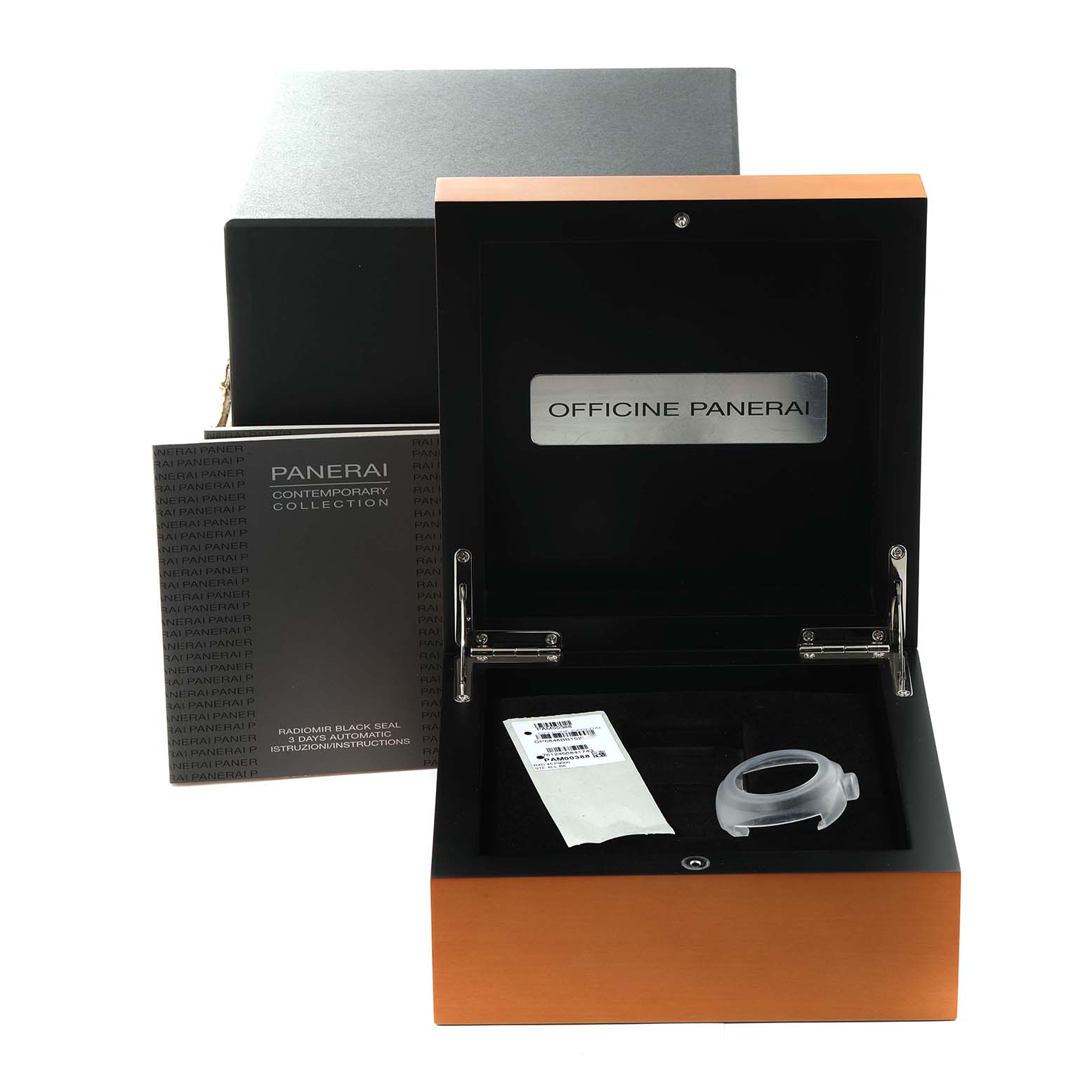 The image shows a Panerai Radiomir PAM00388 Men's Stainless Steel Black Dial PAM00388 Men's Stainless Steel Black Dial watch box with an open lid, accompanying paperwork, and a protective watch cover.