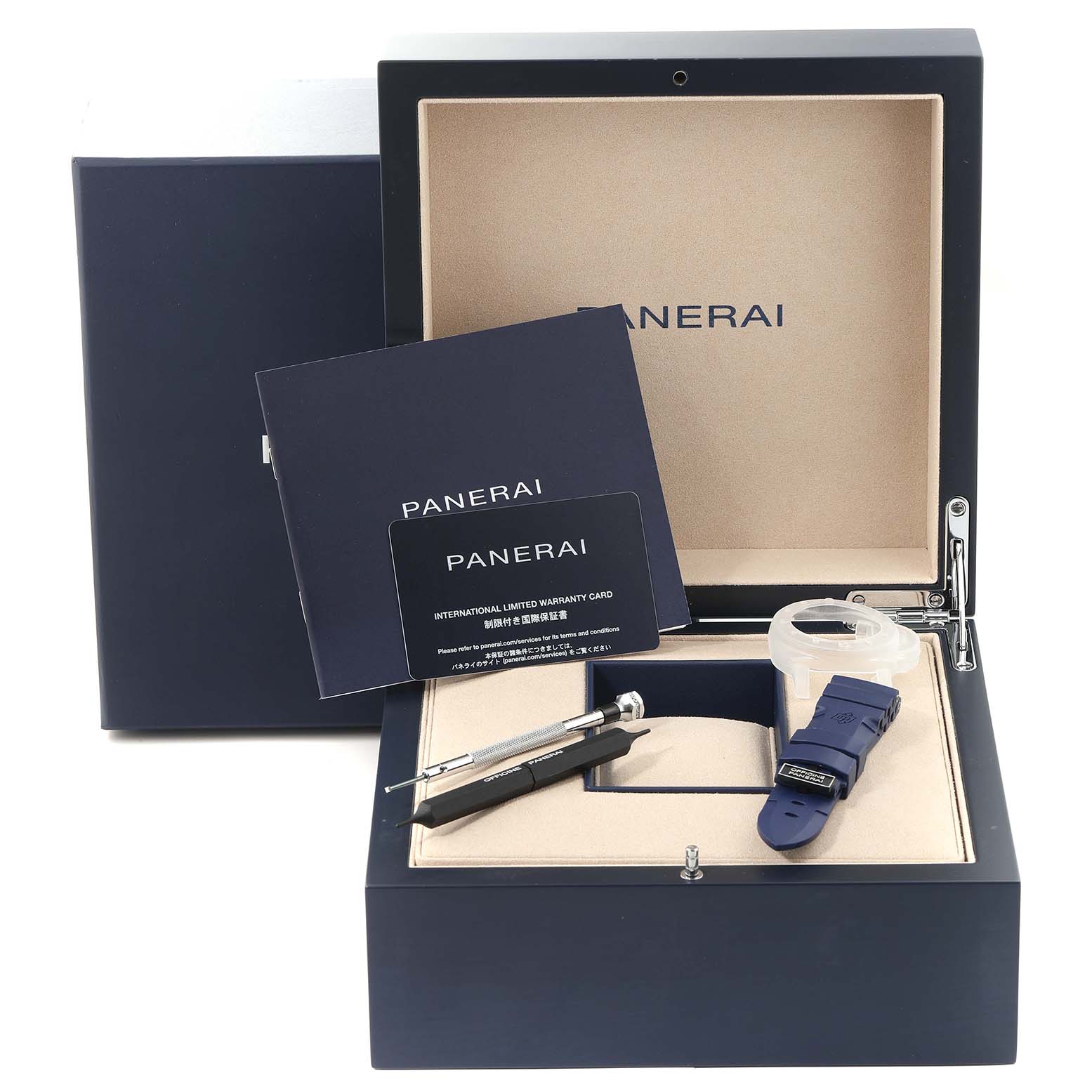 This image shows the Panerai Submersible PAM01565 Men's Stainless Steel Blue Dial PAM01565 Men's Stainless Steel Blue Dial watch accessories, including a strap, tools, and warranty card, inside an open presentation box.