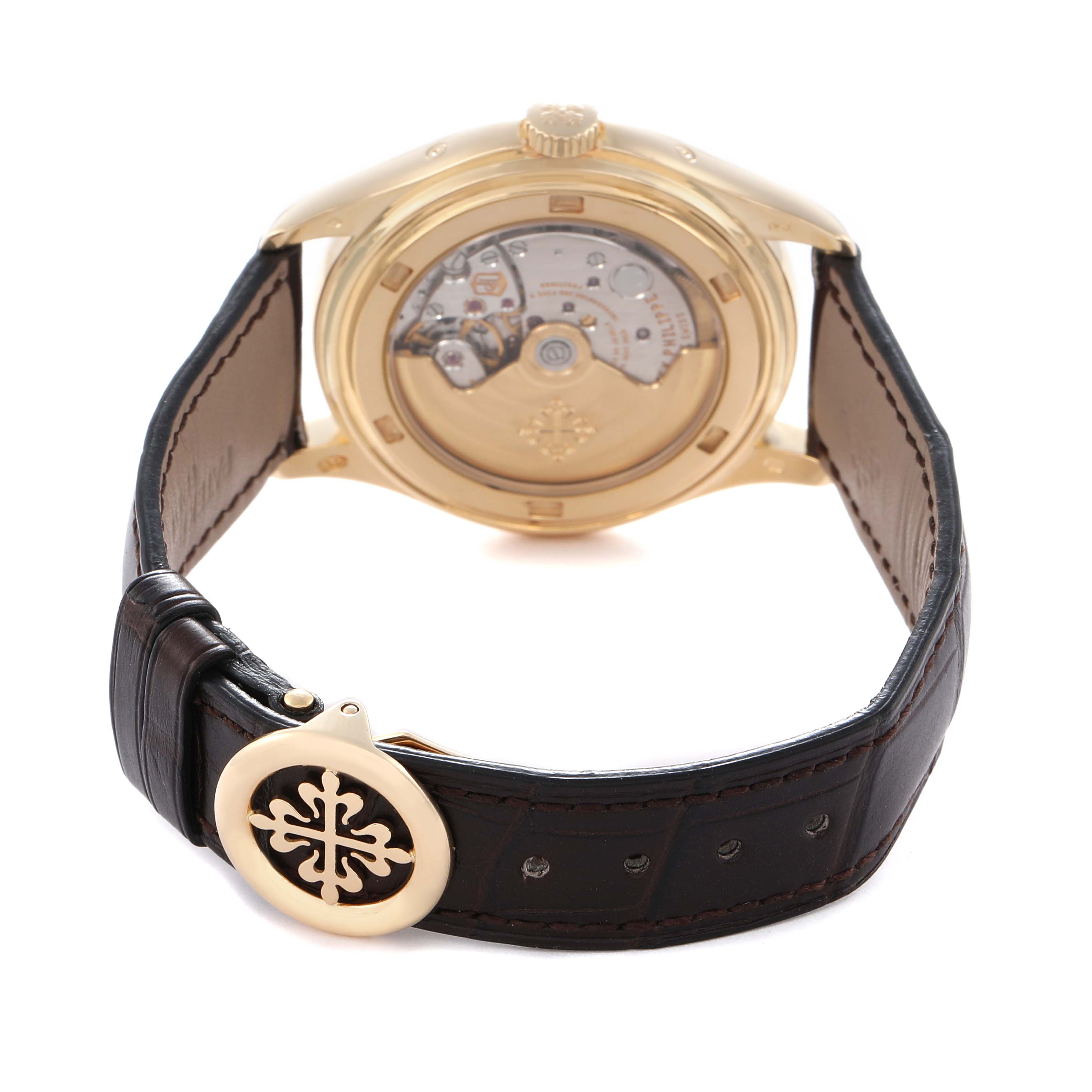 The image shows the back view of the Patek Philippe Complications model 5146J, highlighting the case back, movement, and the leather strap with buckle.