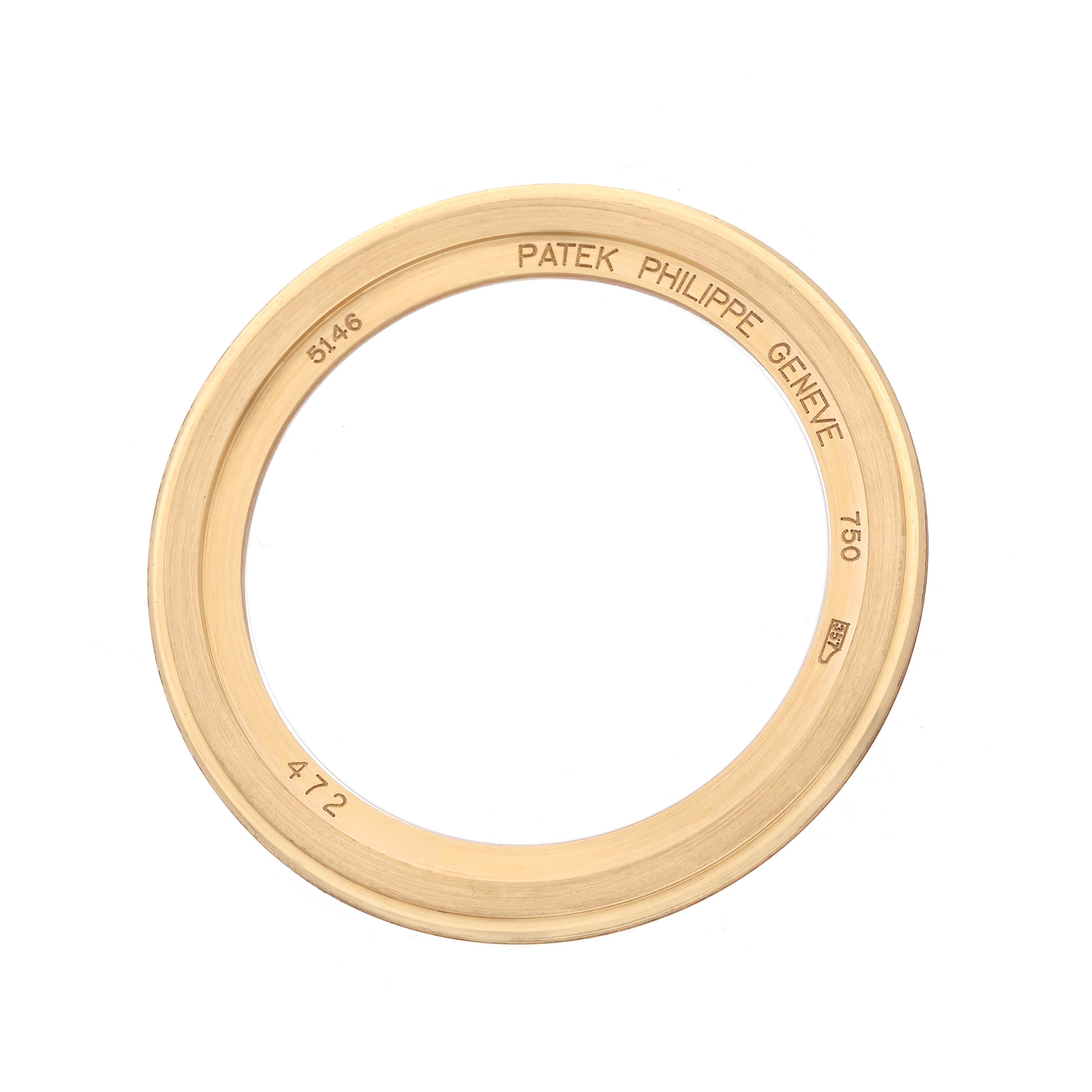 The image shows a gold bezel for the Patek Philippe Complications model 5146J, viewed from above with engraved details visible.