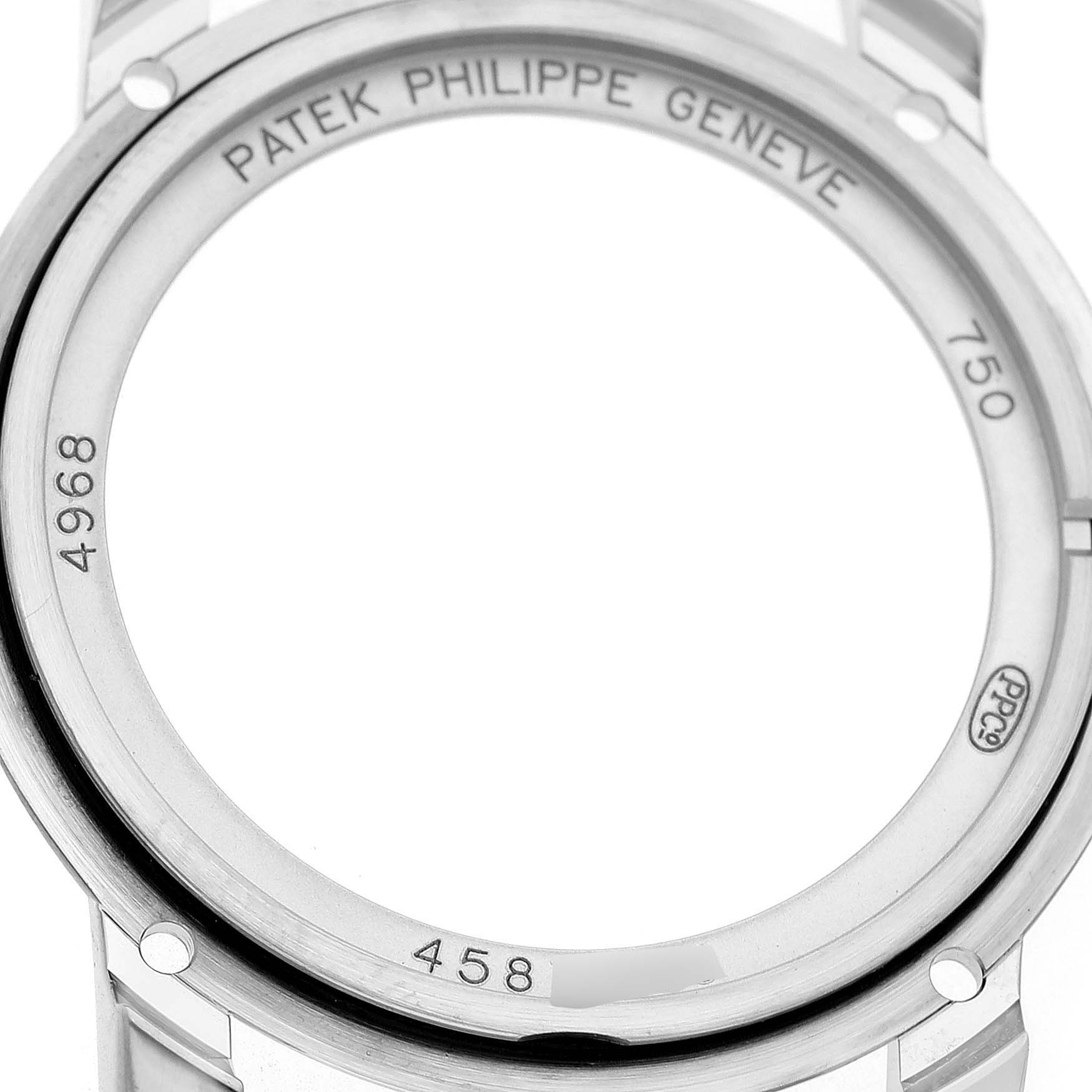 The image shows the back casing of a Patek Philippe Complications 4968G Women's White Gold Mother of Pearl Dial watch, highlighting engraved details and serial numbers.