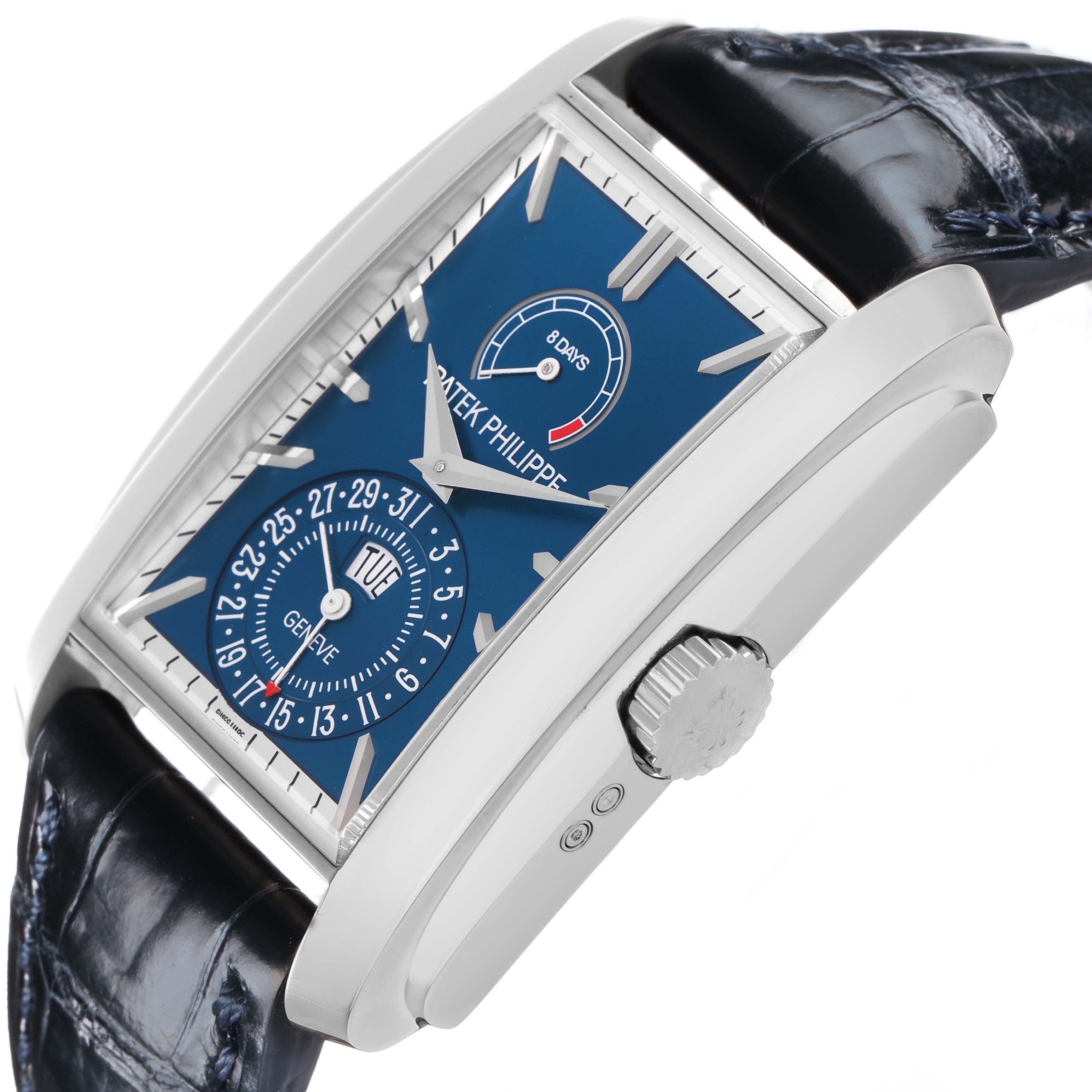 The Patek Philippe Gondolo 5200 Men's White Gold Blue Dial watch is shown at an angle highlighting the side profile, crown, and detailed dial features.