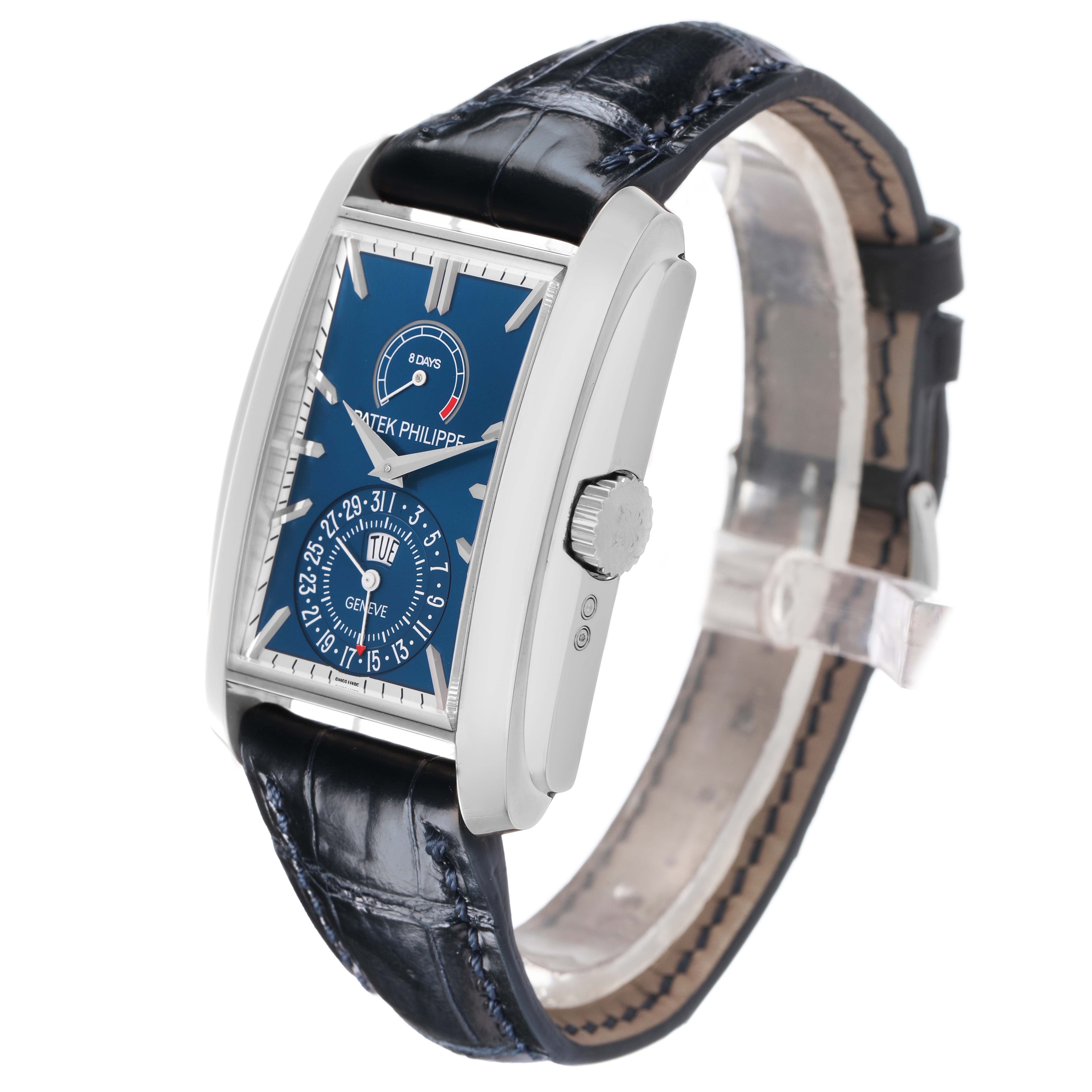 The Patek Philippe Gondolo 5200 Men's White Gold Blue Dial watch is shown at a slight side angle, highlighting the dial, crown, and leather strap.
