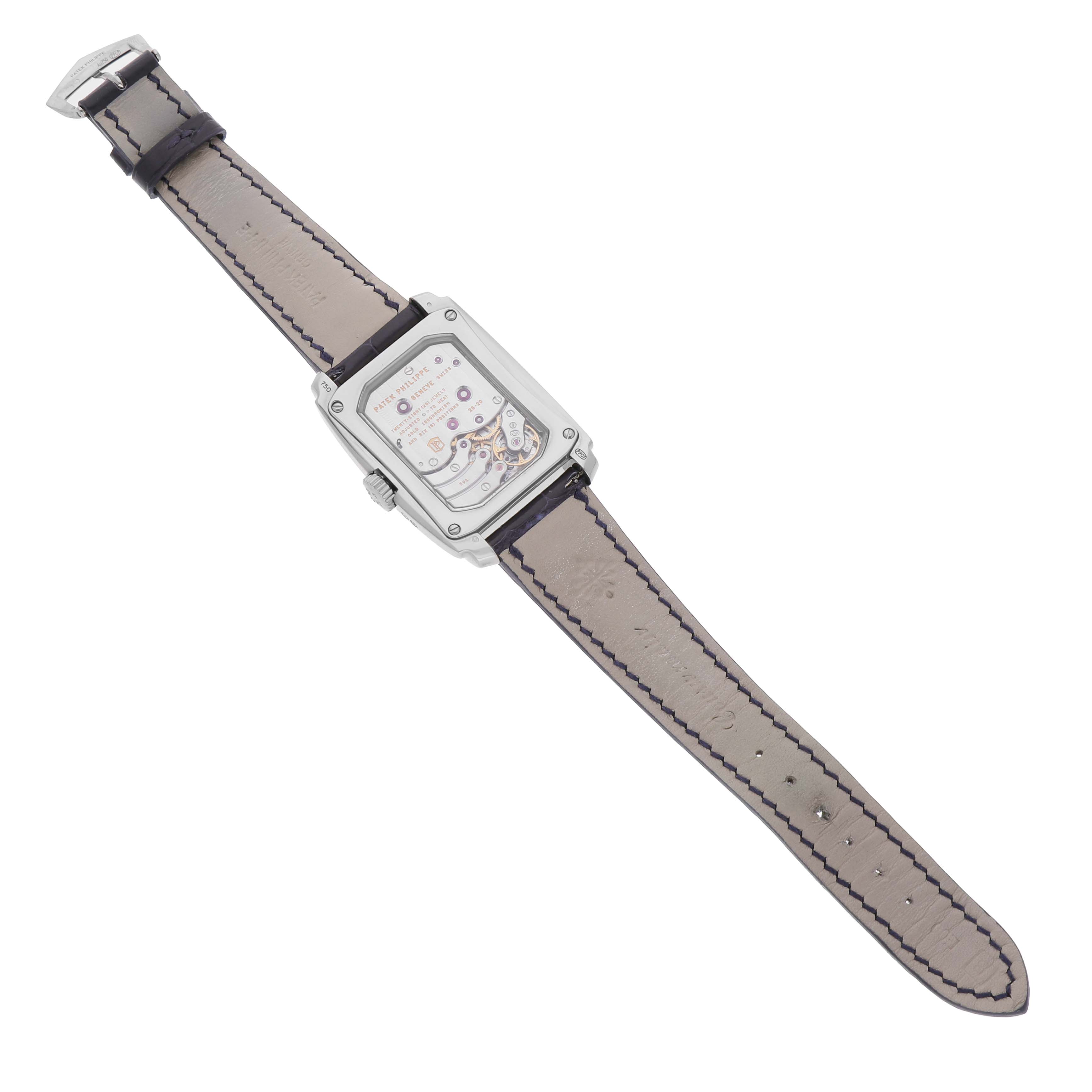 The image shows the back view of a Patek Philippe Gondolo 5200 Men's White Gold Blue Dial watch, highlighting its case, movement, and full leather strap.