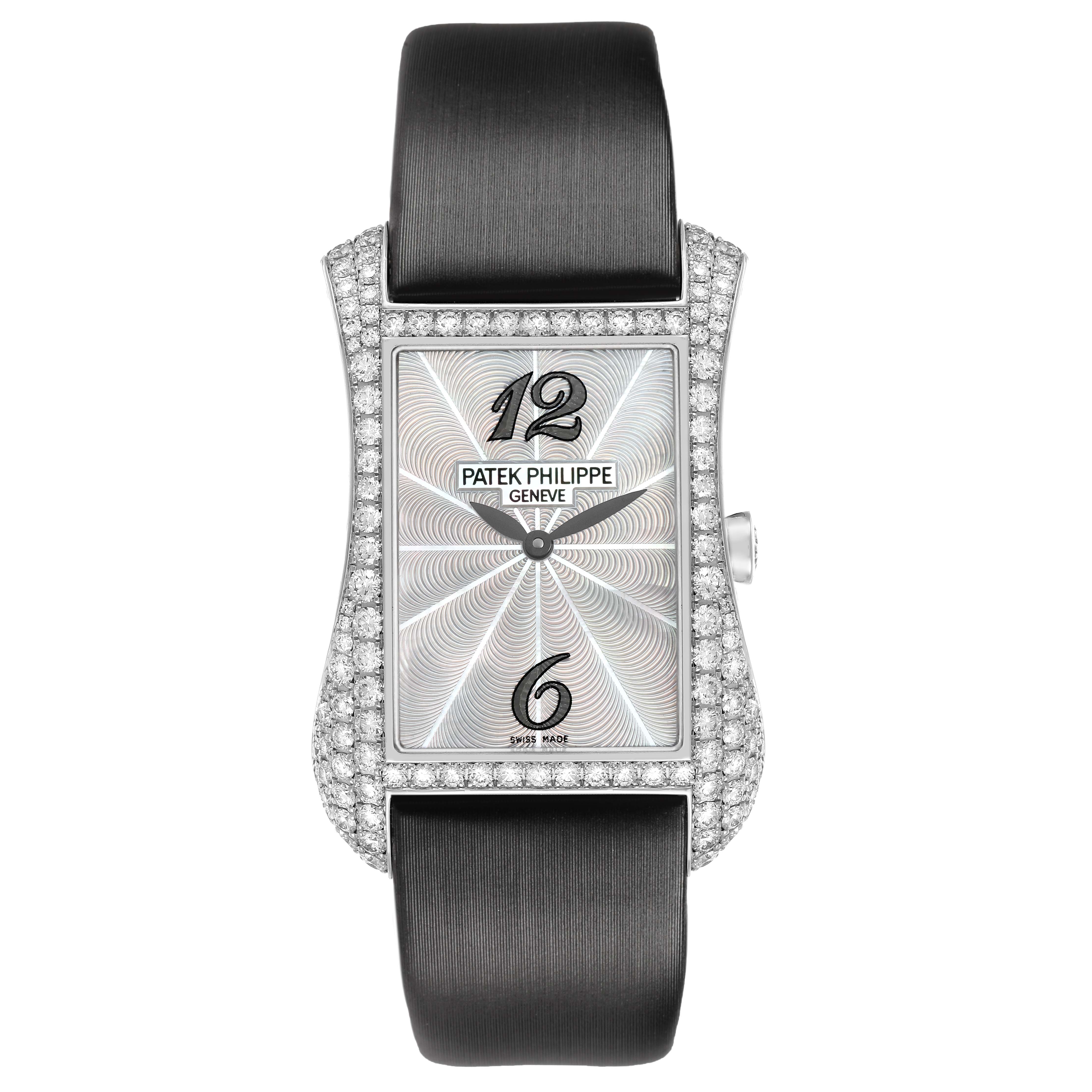 The image shows the Patek Philippe Gondolo 4973G Women's White Gold Mother of Pearl Dial watch from a front angle, highlighting its rectangular dial and diamond-encrusted case.