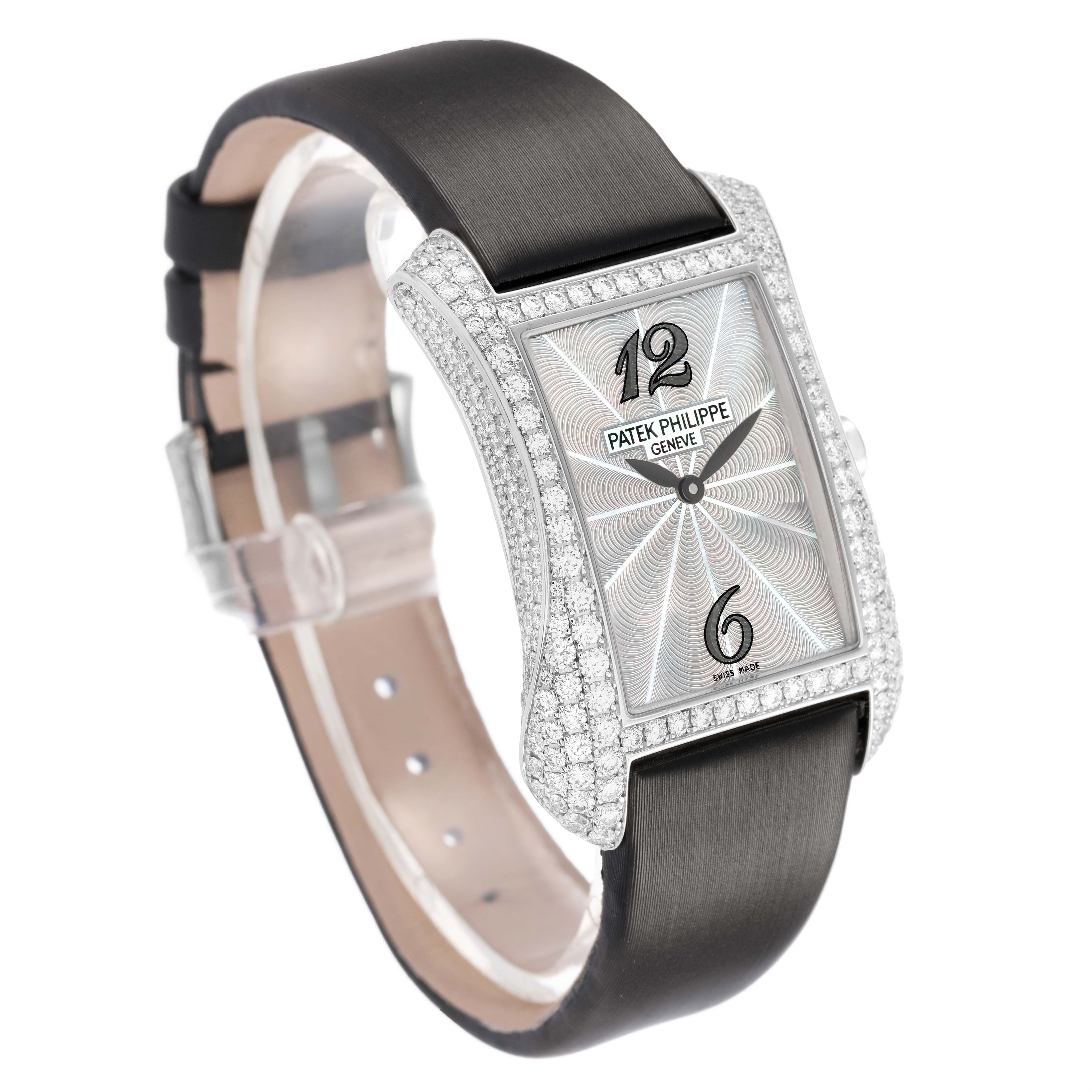 The image shows a Patek Philippe Gondolo 4973G Women's White Gold Mother of Pearl Dial watch at a three-quarter angle, highlighting its diamond-set bezel and black strap.