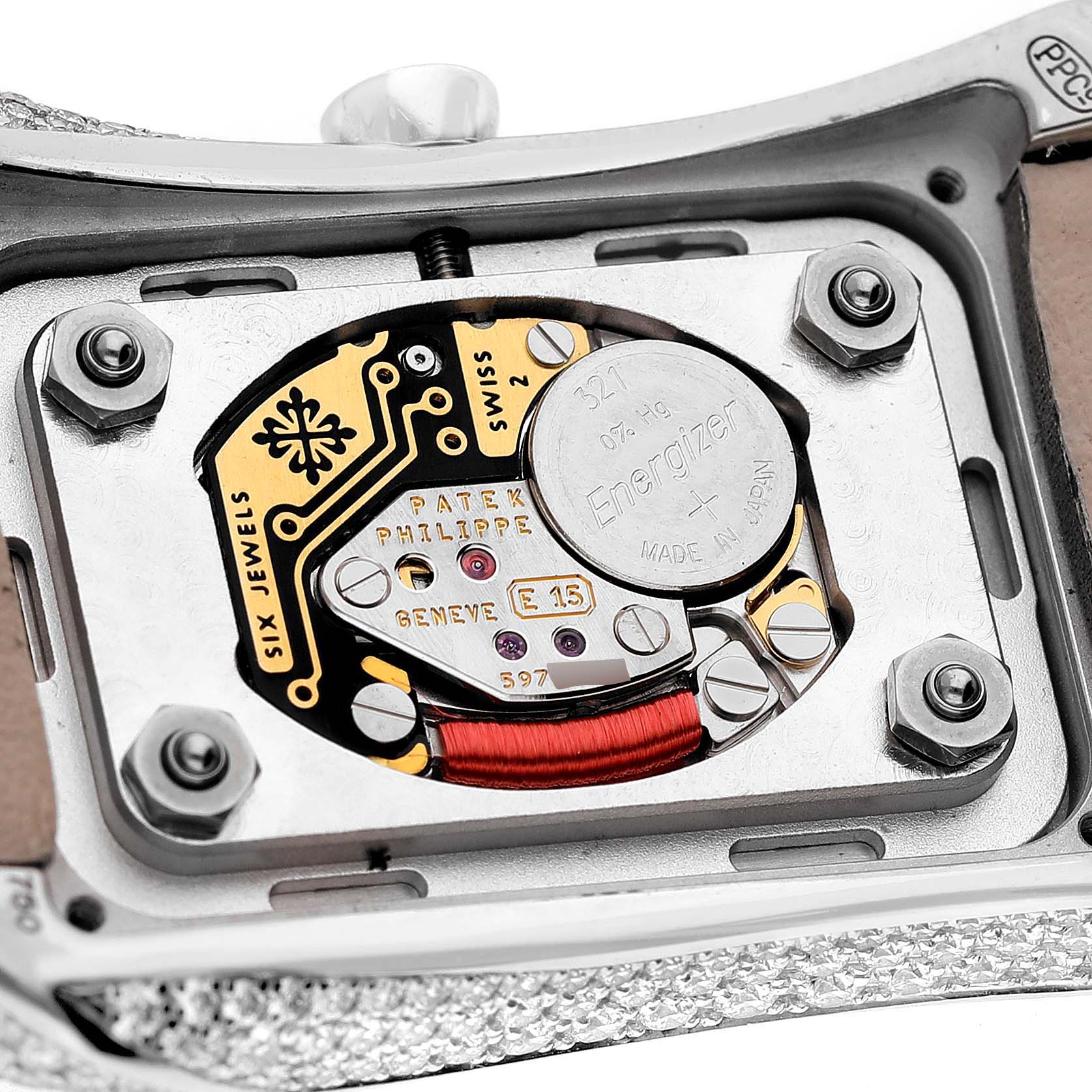 This image shows the back view of a Patek Philippe Gondolo 4973G Women's White Gold Mother of Pearl Dial, highlighting its internal movement and components.