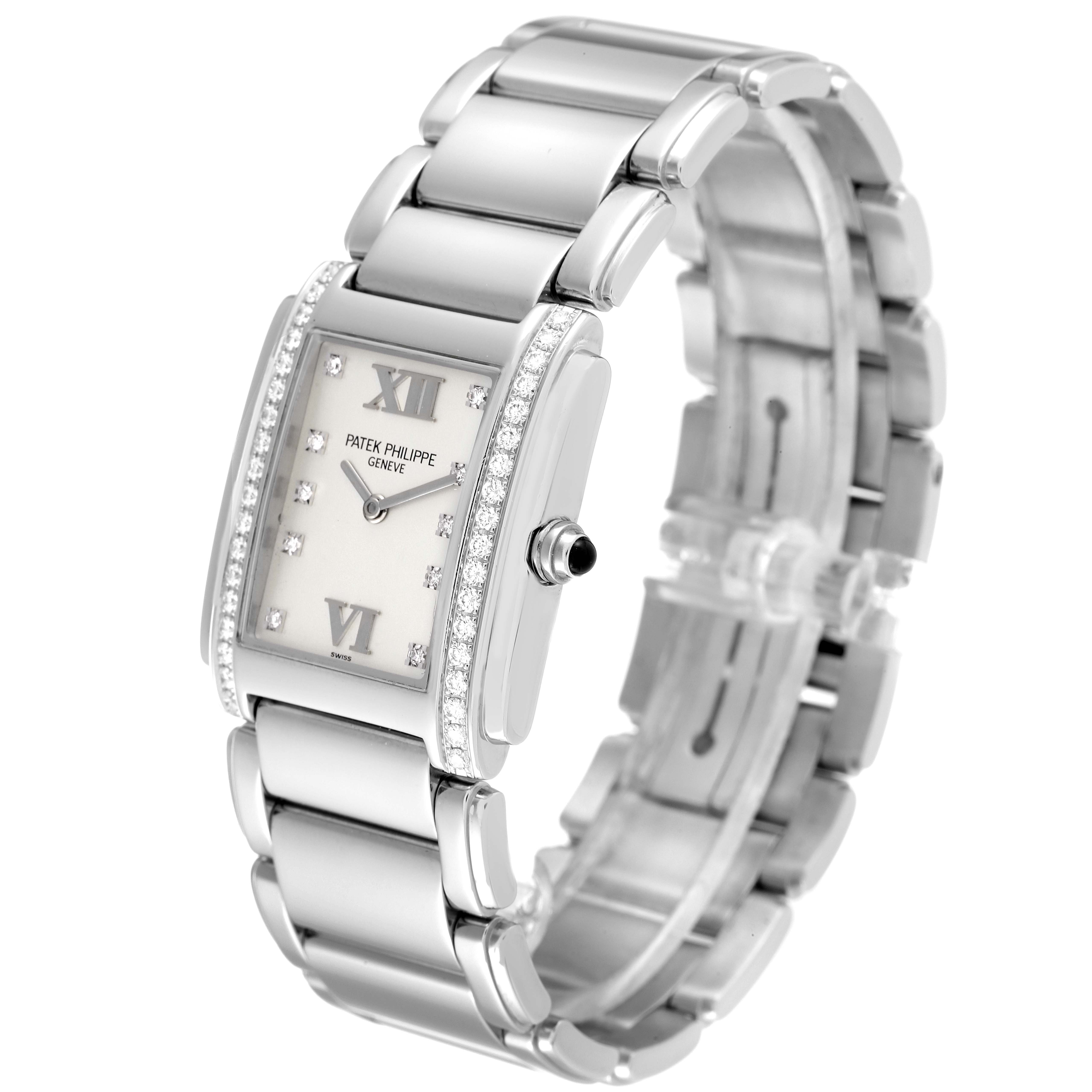 The image shows a Patek Philippe Twenty-4 4910/10A-010 Women's Stainless Steel Silver Dial 4910/10A-010 Women's Stainless Steel Silver Dial model watch from a front-right angle, highlighting the dial, bezel, and bracelet.