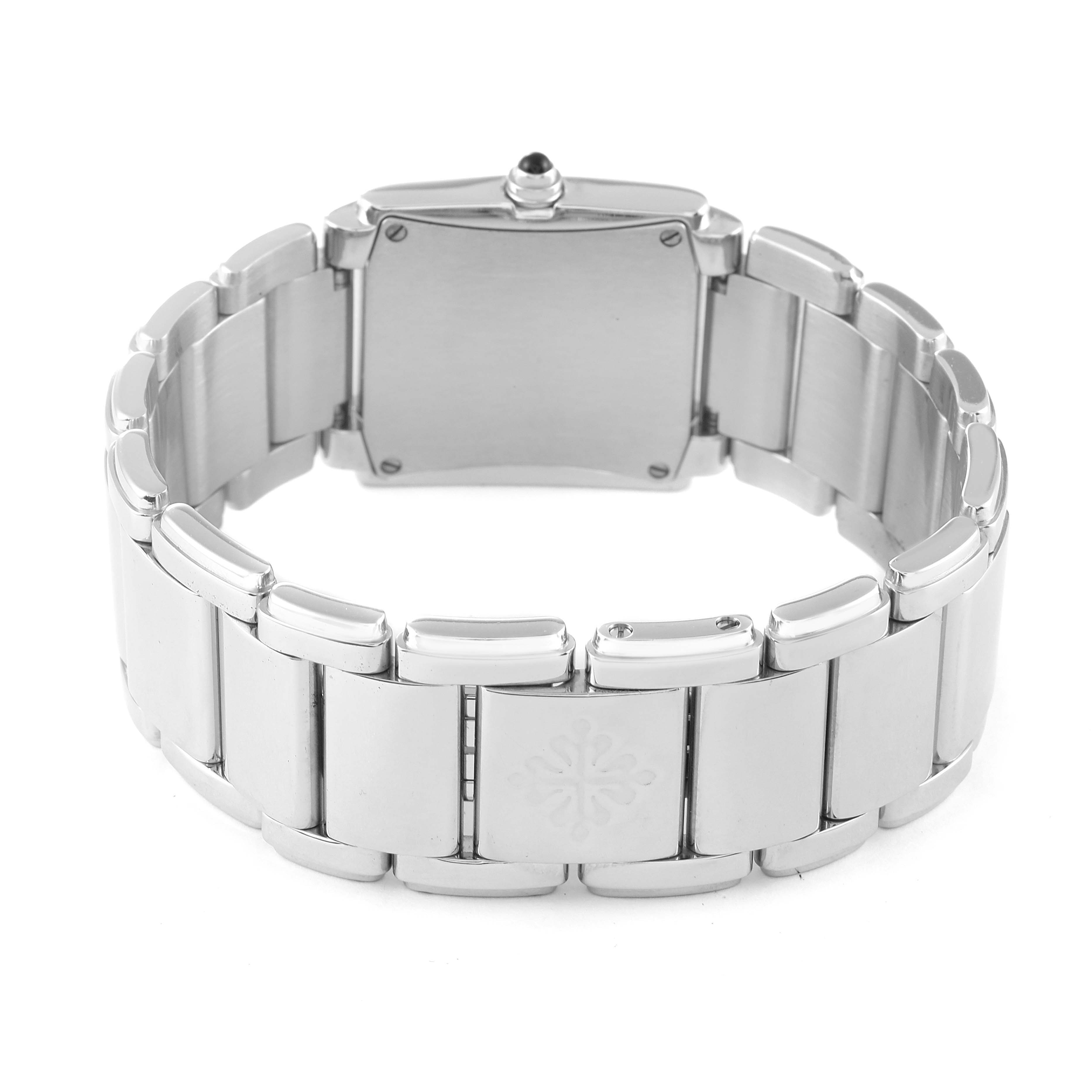 The image shows the back view of the Patek Philippe Twenty-4 4910/10A-010 Women's Stainless Steel Silver Dial 4910/10A-010 Women's Stainless Steel Silver Dial model, focusing on the bracelet, clasp, and case back.