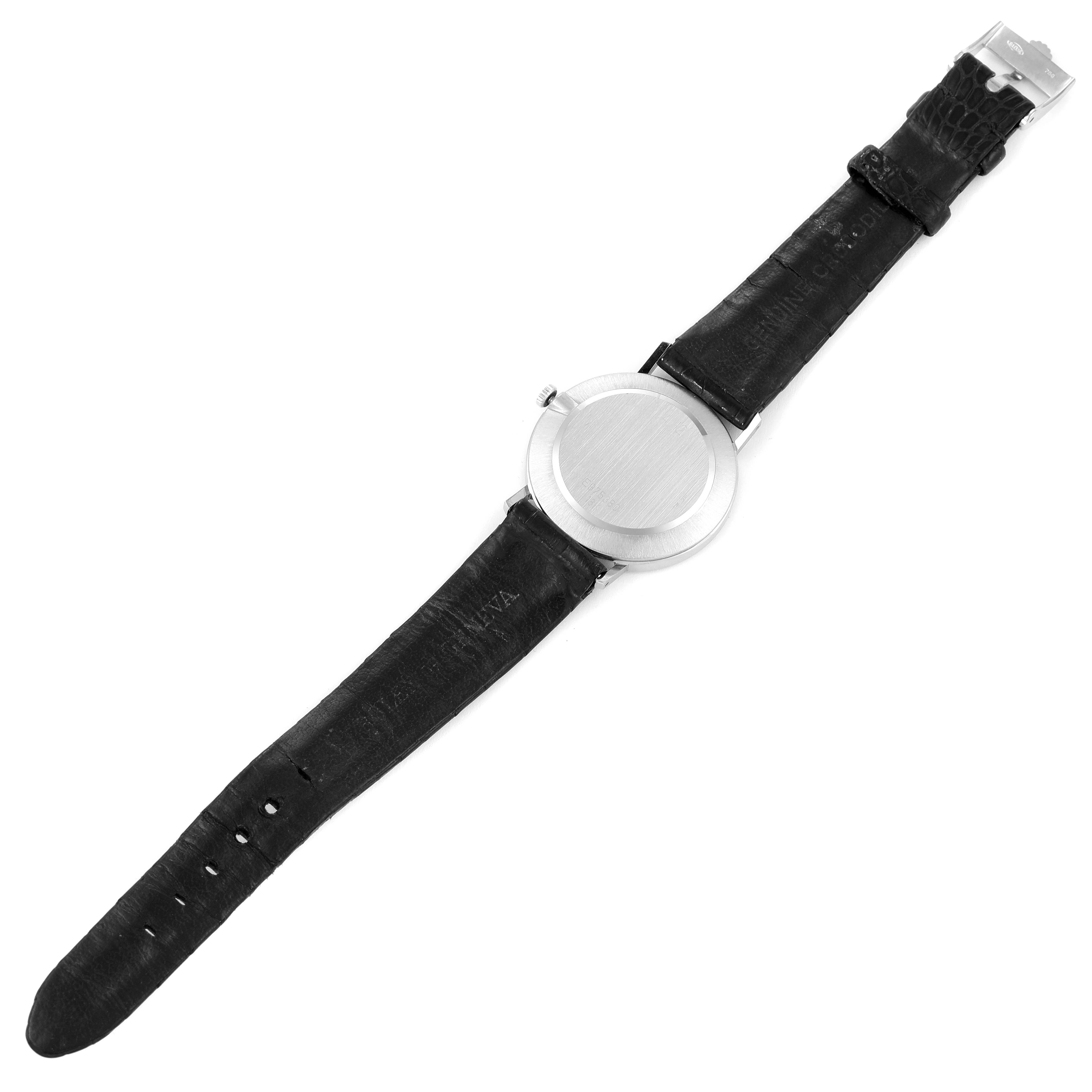 The image shows the backside and strap of a Rolex Cellini 4112 Men
s White Gold Silver Dial 4112 Men
s White Gold Silver Dial watch laid flat.