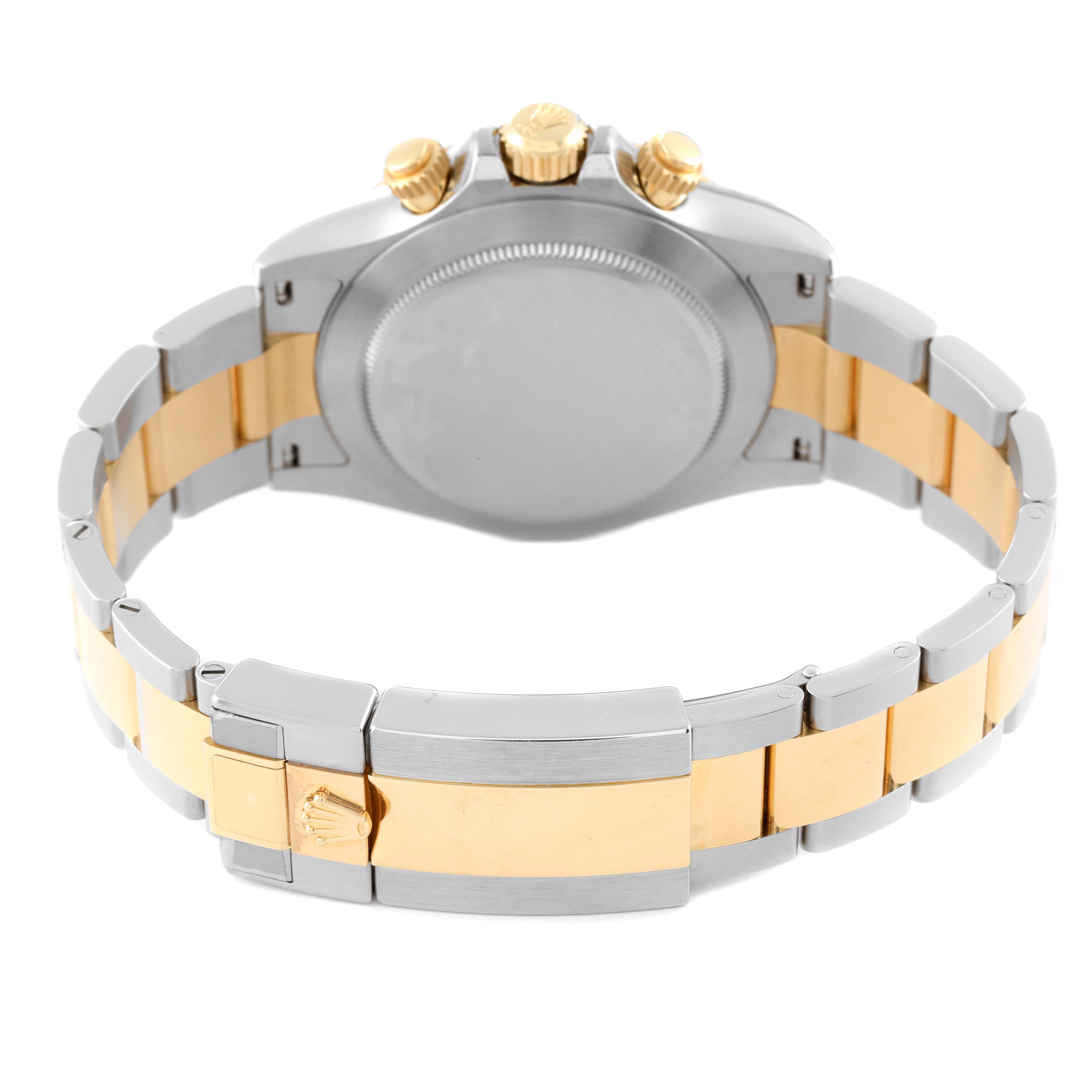 The image shows the back and clasp of the Rolex Daytona 116503 Men's Steel and Gold (two tone) Black Dial 116503 Men's Steel and Gold (two tone) Black Dial watch, highlighting the two-tone bracelet and the crown-adorned clasp.