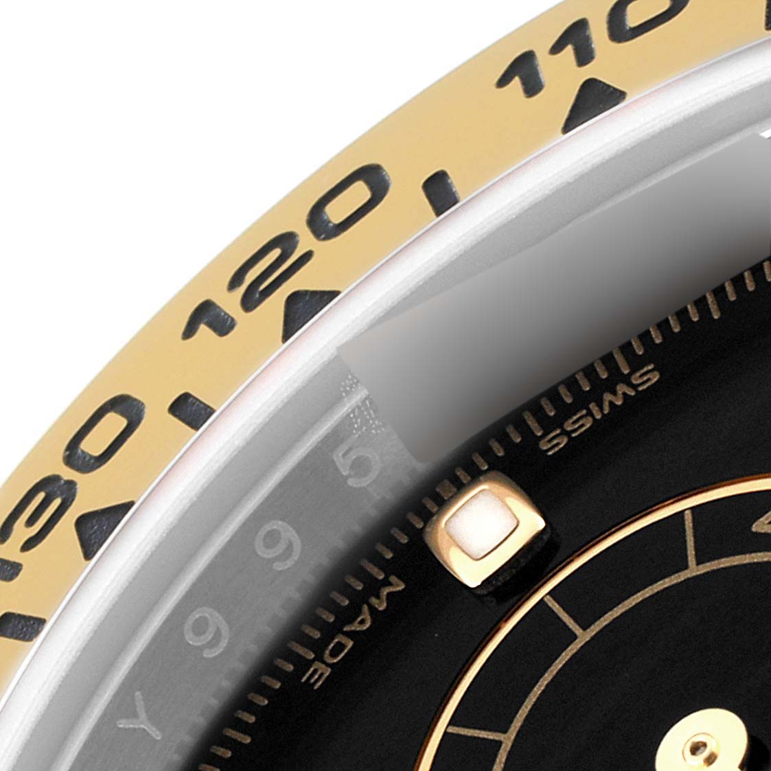 The image shows a close-up of the bezel and partial dial of the Rolex Daytona 116503 Men's Steel and Gold (two tone) Black Dial 116503 Men's Steel and Gold (two tone) Black Dial watch model.