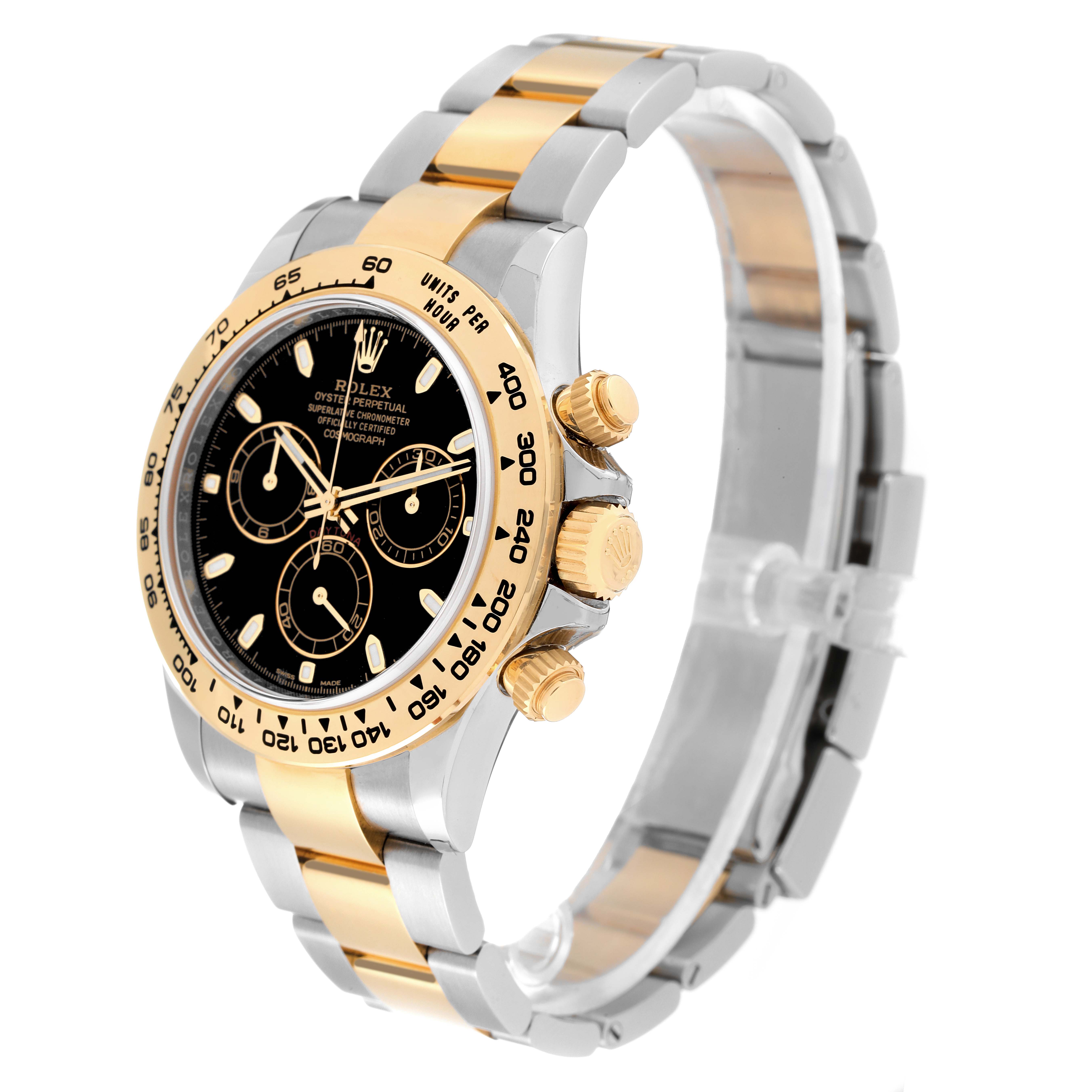 The Rolex Daytona 116503 Men's Steel and Gold (two tone) Black Dial 116503 Men's Steel and Gold (two tone) Black Dial watch is shown at a three-quarter angle, highlighting its gold bezel, black dial, and two-tone bracelet.