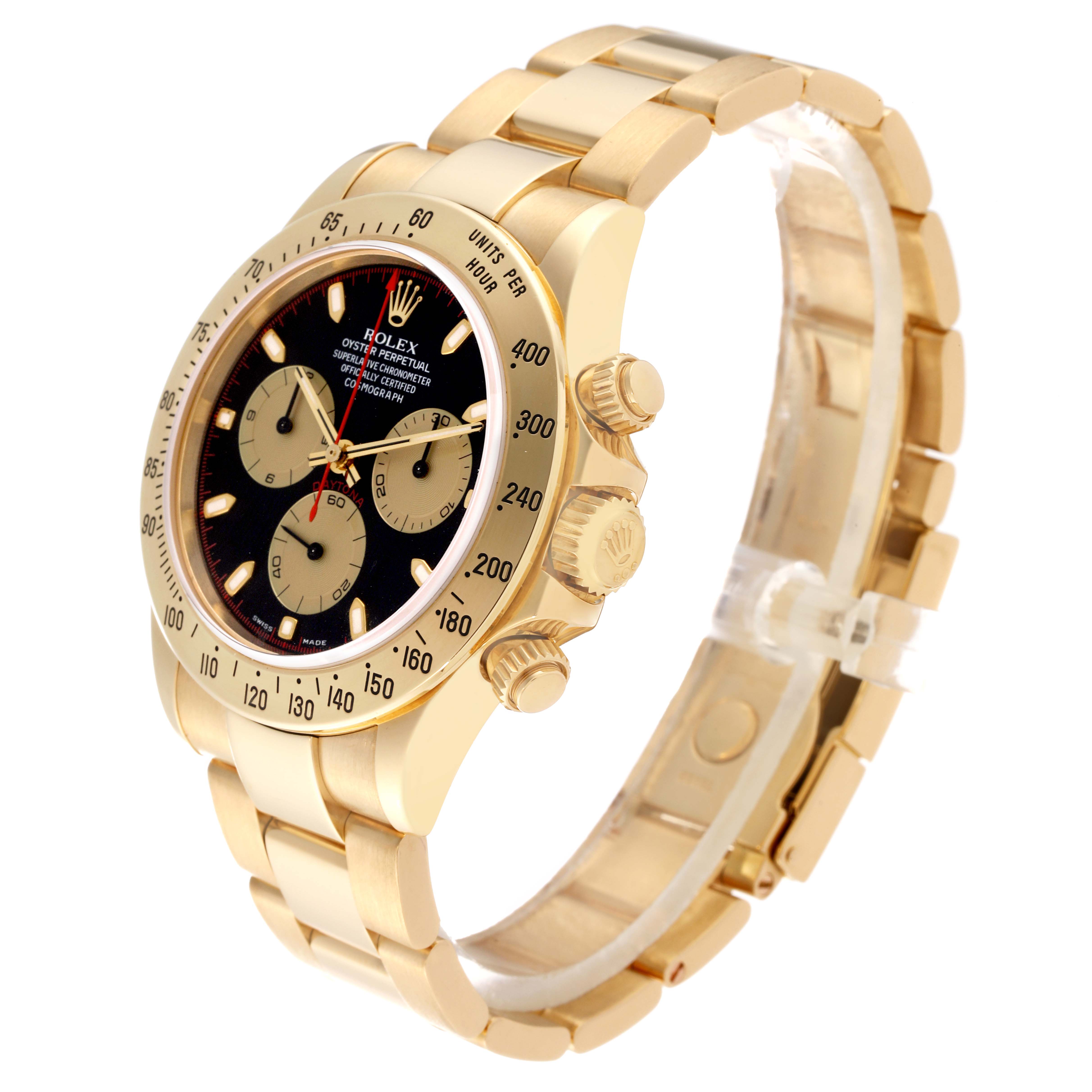 The image shows a Rolex Daytona 116528 Men
s Yellow Gold Black Dial 116528 Men
s Yellow Gold Black Dial watch at a three-quarter angle, showcasing the dial, bezel, and bracelet.