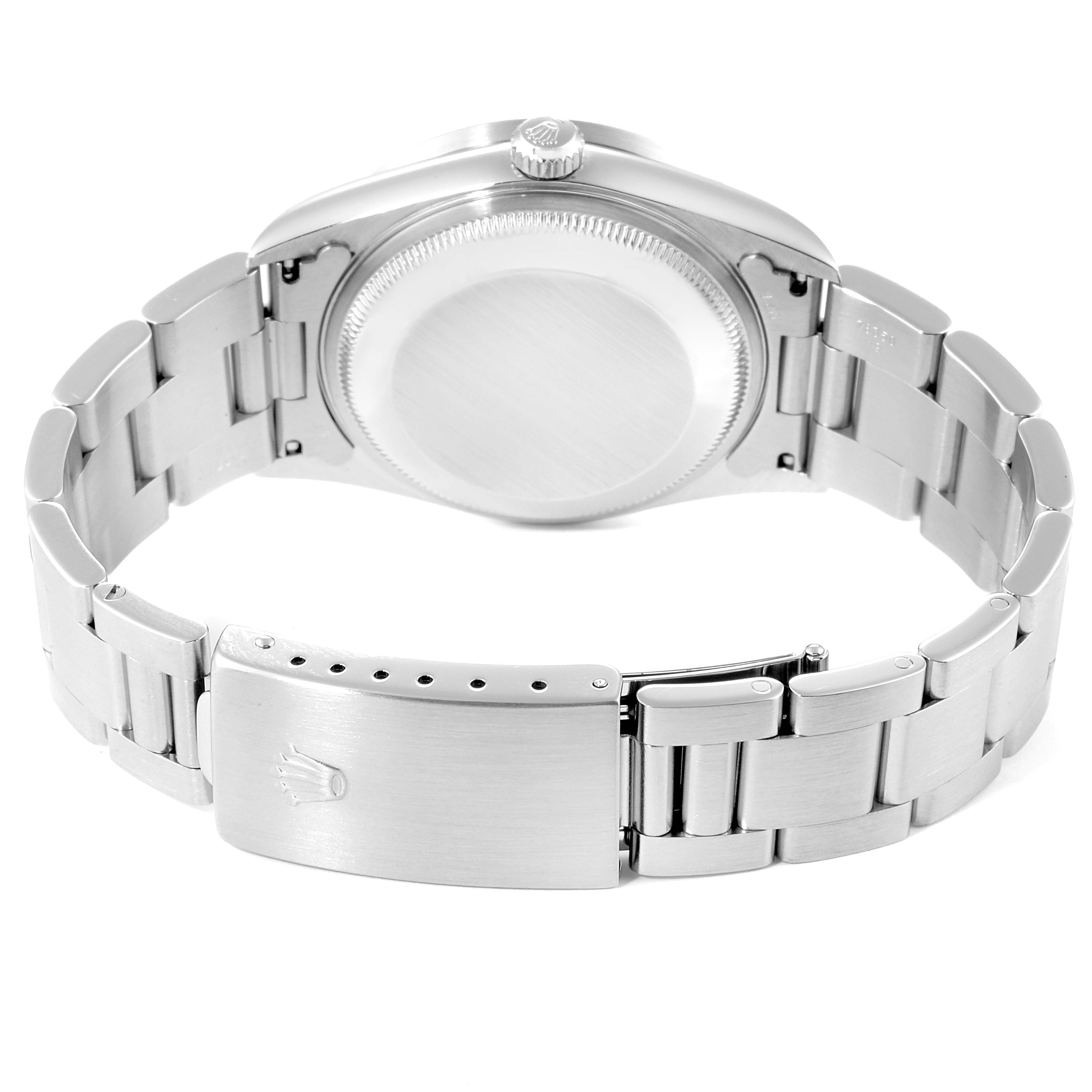 The image shows the back side and the bracelet of a Rolex Date 15210 Men's Stainless Steel Blue Dial 15210 Men's Stainless Steel Blue Dial model watch.