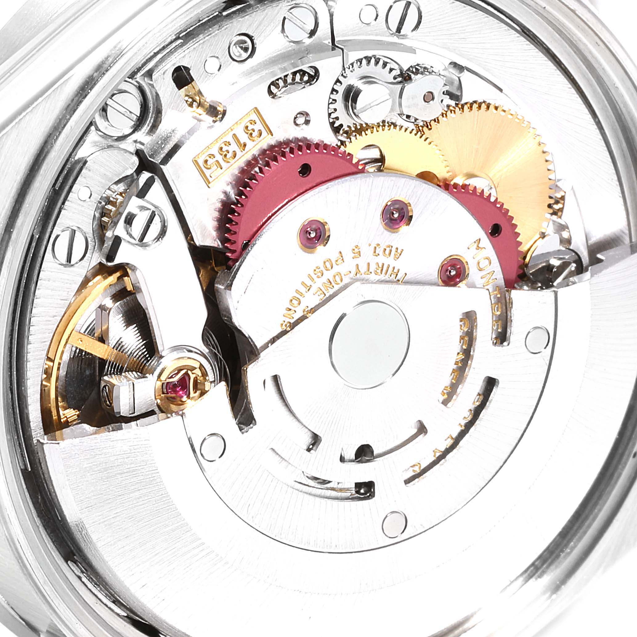 This close-up shows the intricate inner mechanical movement and gears of a Rolex Date 15210 Men's Stainless Steel Blue Dial 15210 Men's Stainless Steel Blue Dial model watch.