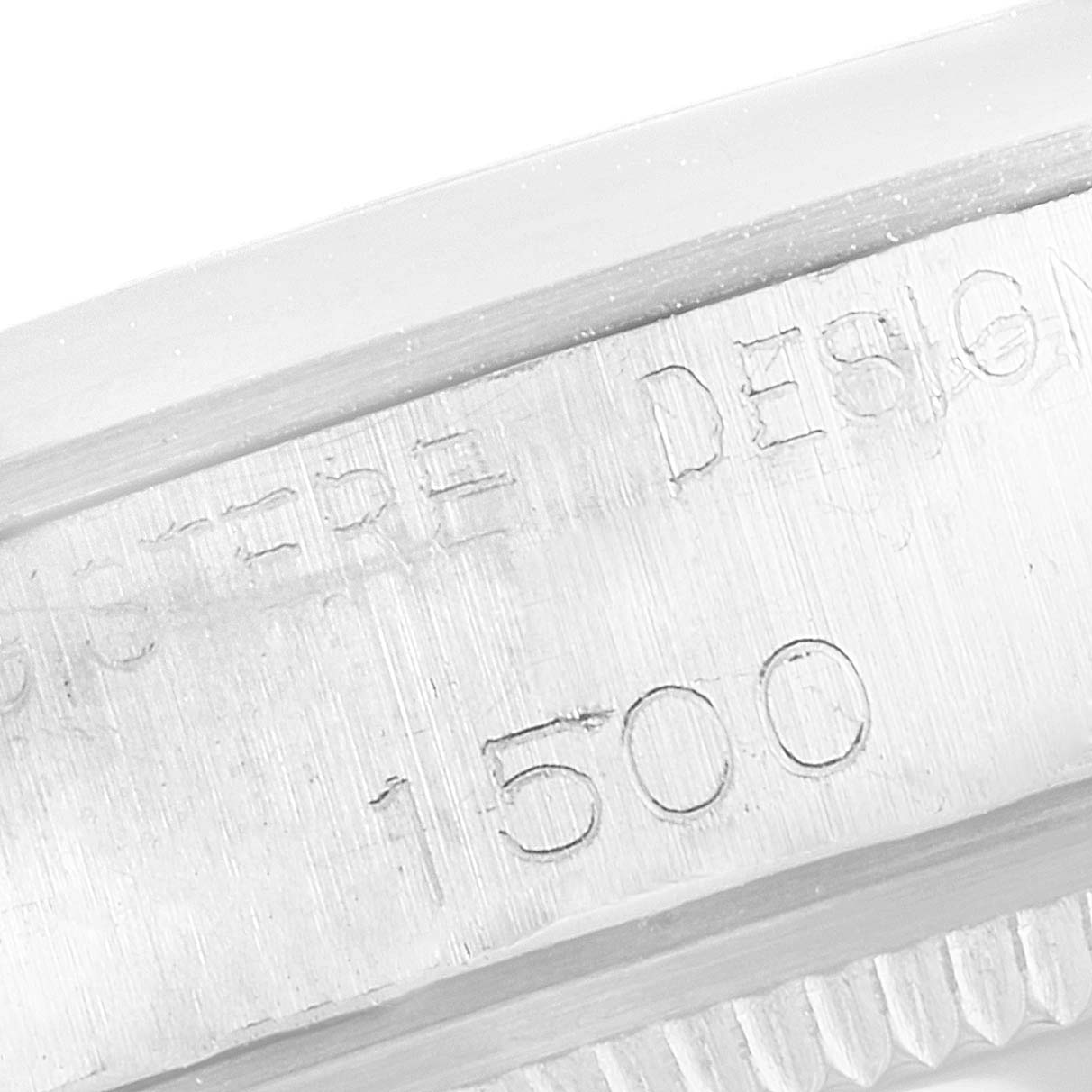 The image shows a close-up of the Rolex Vintage Collection 1500 Men's Stainless Steel Black Dial 1500 Men's Stainless Steel Black Dial watch’s side case, displaying the engraved model number "1500."