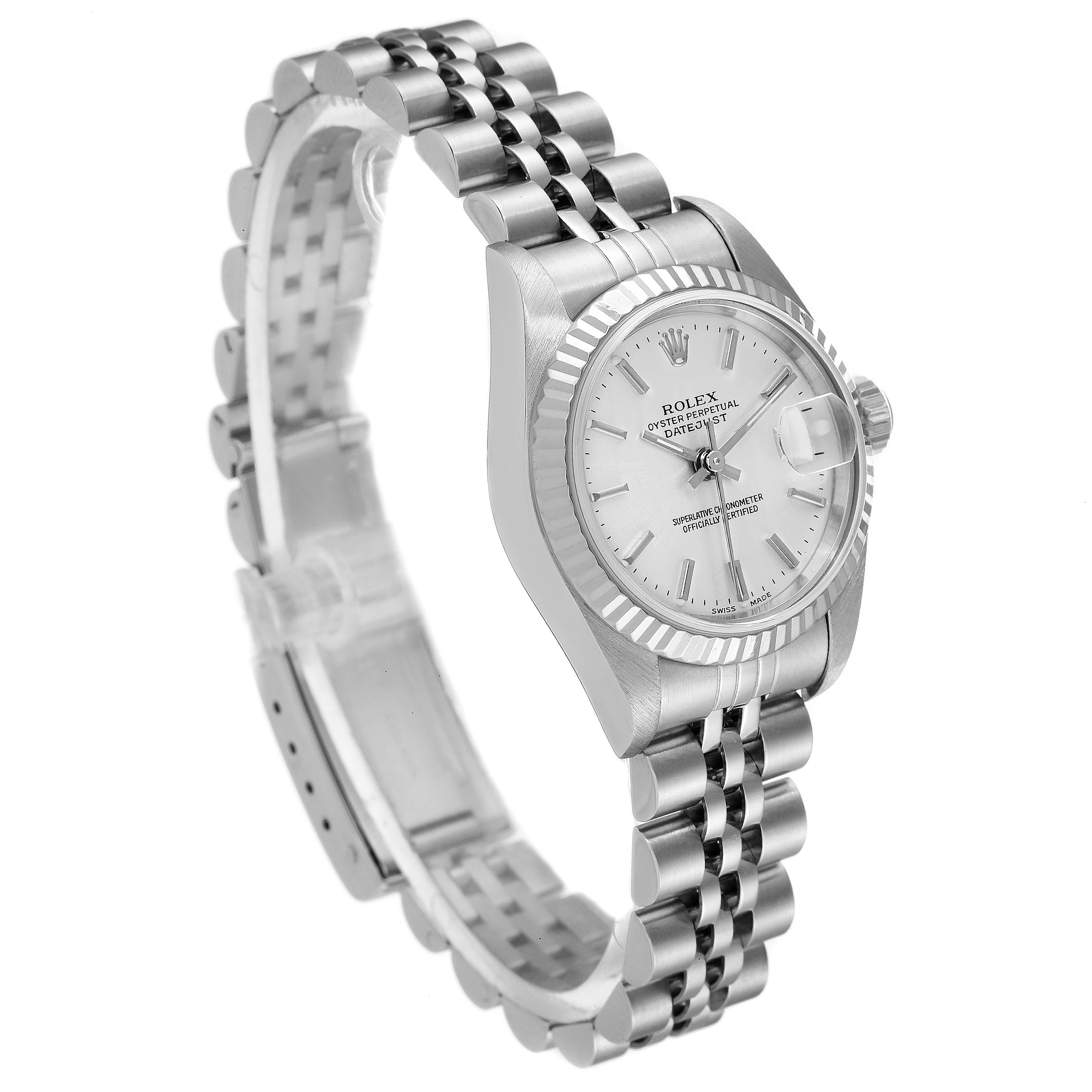 The image shows a Rolex Datejust 79174 Women
s Stainless Steel Silver Dial 79174 Women
s Stainless Steel Silver Dial watch at a three-quarter angle, highlighting the face, fluted bezel, and Jubilee bracelet.