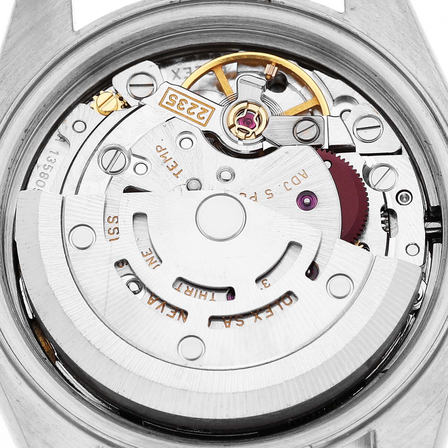 The image shows the movement of a Rolex Datejust 79173 Women's Stainless Steel White Dial watch from the back, highlighting gears and components.