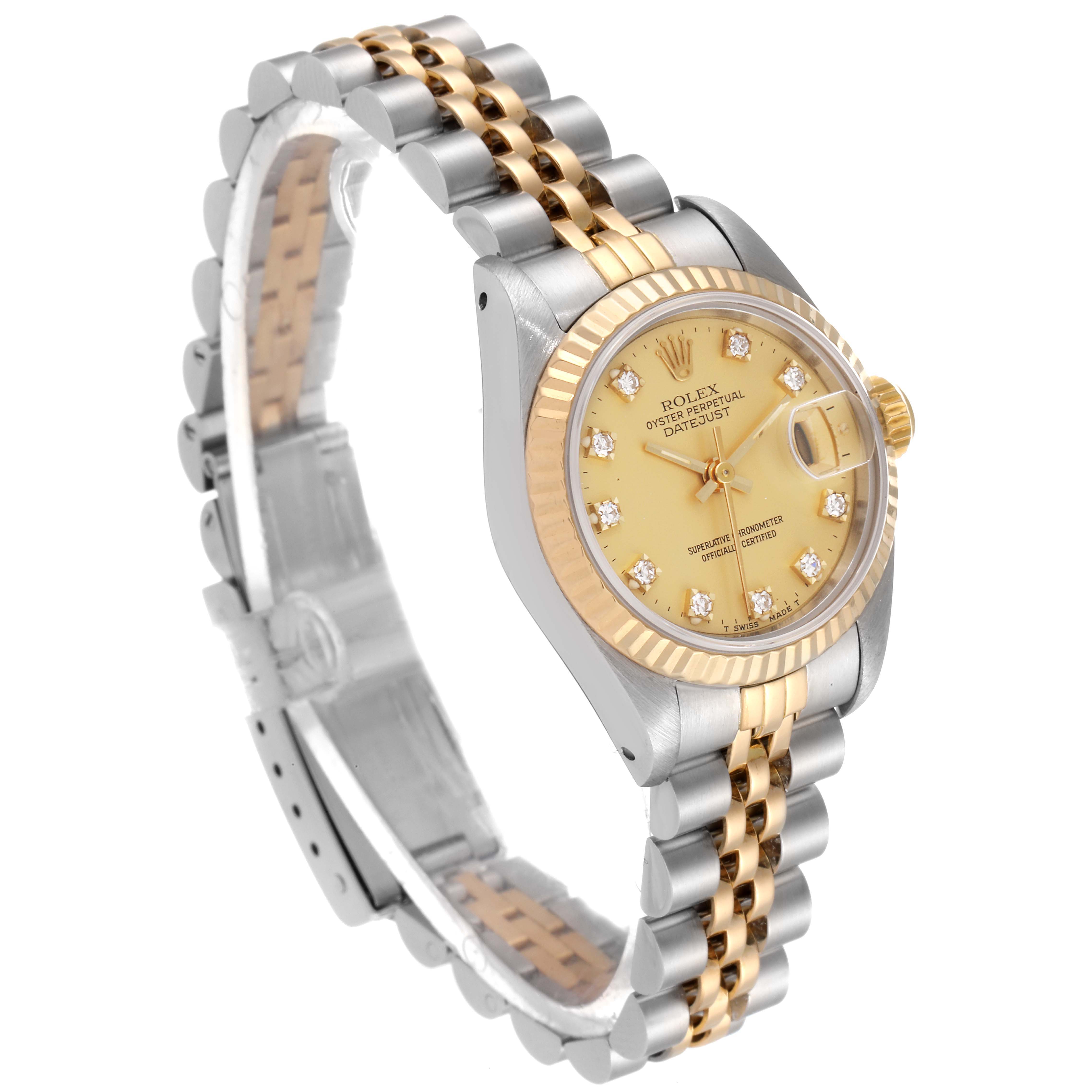 This Rolex Datejust 69173 Women's Steel and Gold (two tone) Champagne Dial 69173 Women's Steel and Gold (two tone) Champagne Dial model is shown from a 3/4 angle, highlighting the gold dial, fluted bezel, and two-tone bracelet.