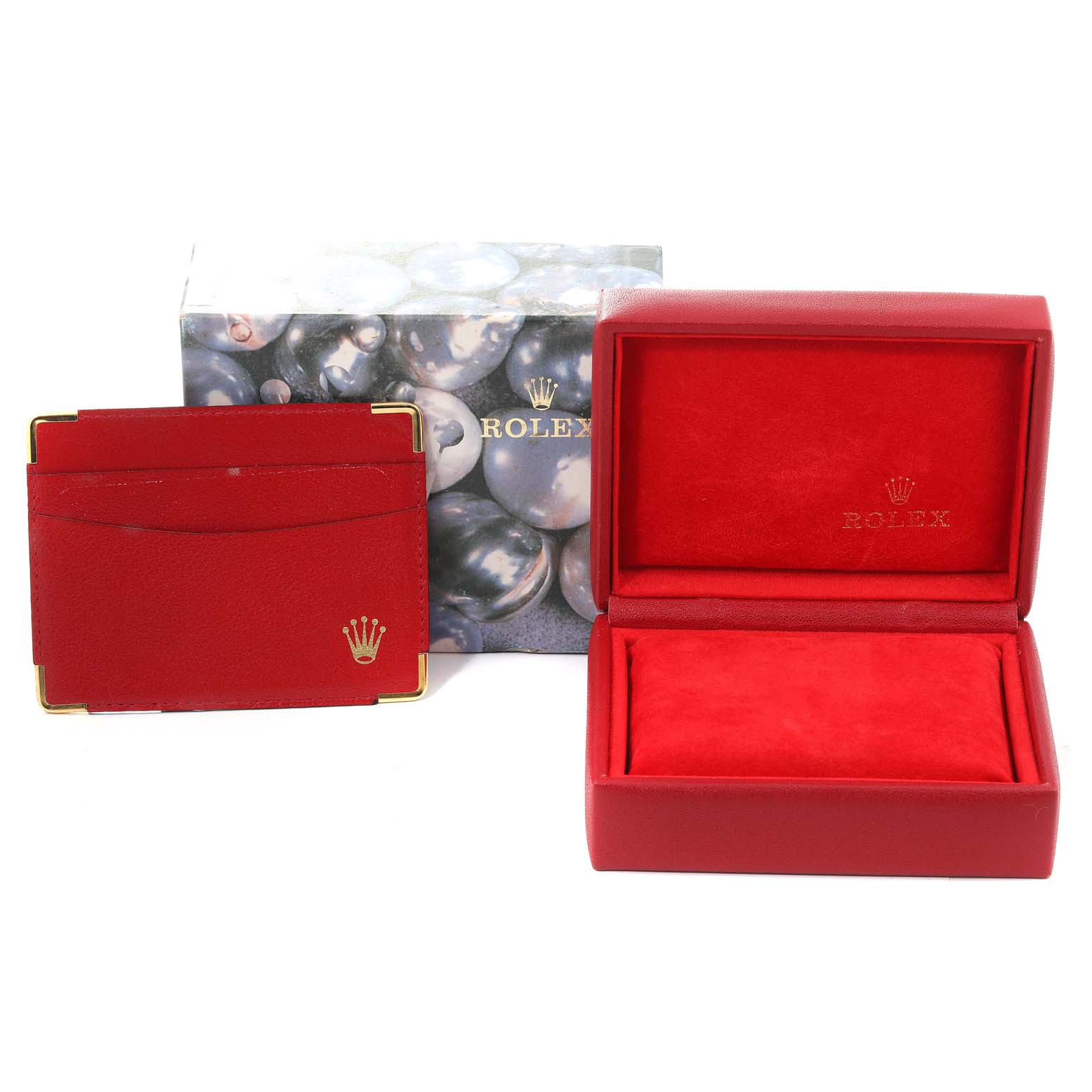 The image shows a red Rolex Datejust 69173 Women's Steel and Gold (two tone) Champagne Dial 69173 Women's Steel and Gold (two tone) Champagne Dial watch box, a red cardholder, and an outer packaging box with the Rolex logo.