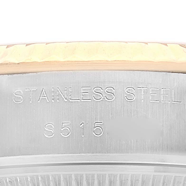 This image shows a close-up angle of the stainless steel case back of a Rolex Datejust 69173 Women's Steel and Gold (two tone) Champagne Dial 69173 Women's Steel and Gold (two tone) Champagne Dial watch.