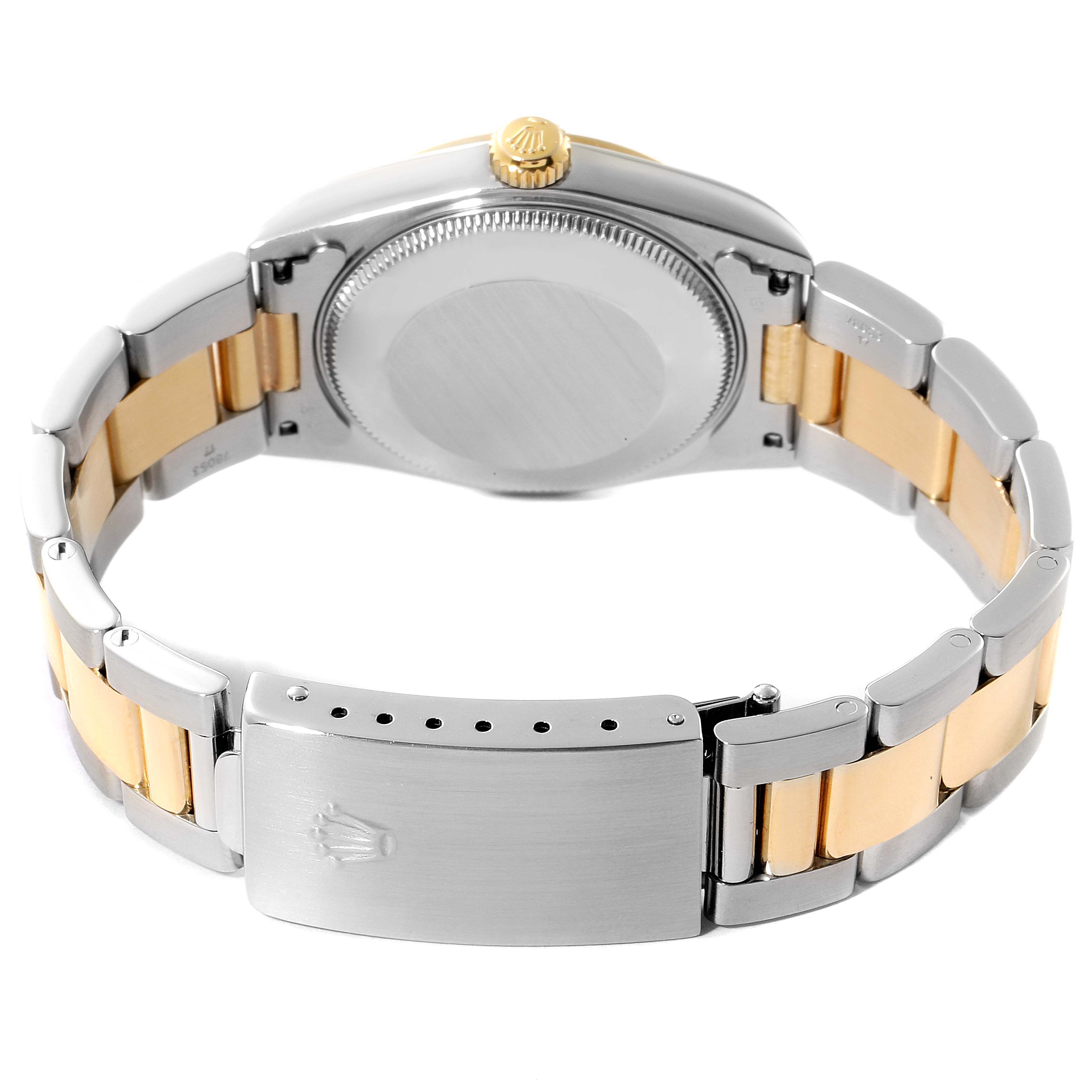 The Rolex Mid-Size 78243 Women's Steel and Gold (two tone) Grey Dial 78243 Women's Steel and Gold (two tone) Grey Dial watch is shown from the back, displaying the clasp, case back, and part of the bracelet.