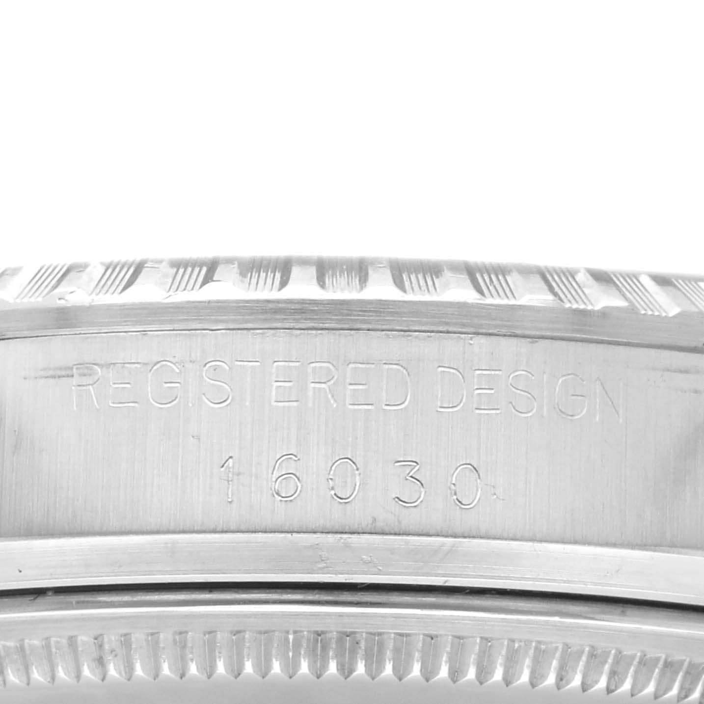 This image shows a close-up of the side casing of a Vintage Collection model by Rolex, featuring the engraved registered design number 16030.