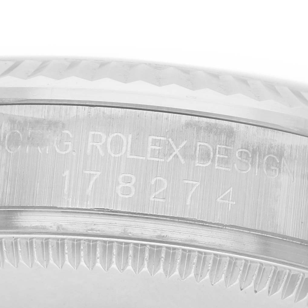 The image shows a close-up of the side of a Rolex Datejust 178274 Women's Steel and Gold (two tone) Mother of Pearl Dial watch case, highlighting the engraved model number.