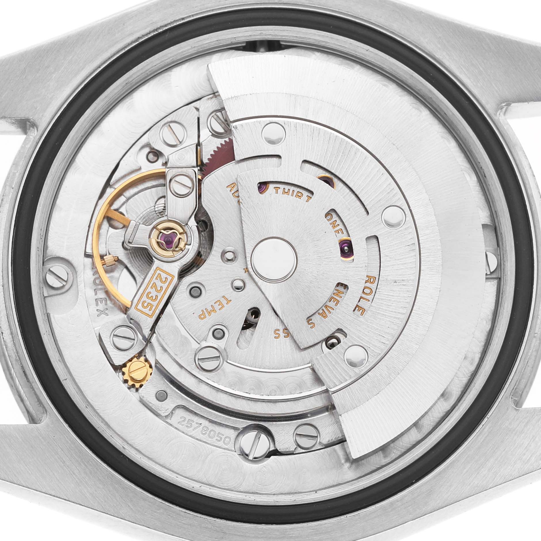 The image shows the intricate rotor and movement components of a Rolex Datejust 178274 Women's Steel and Gold (two tone) Mother of Pearl Dial, viewed from the back.