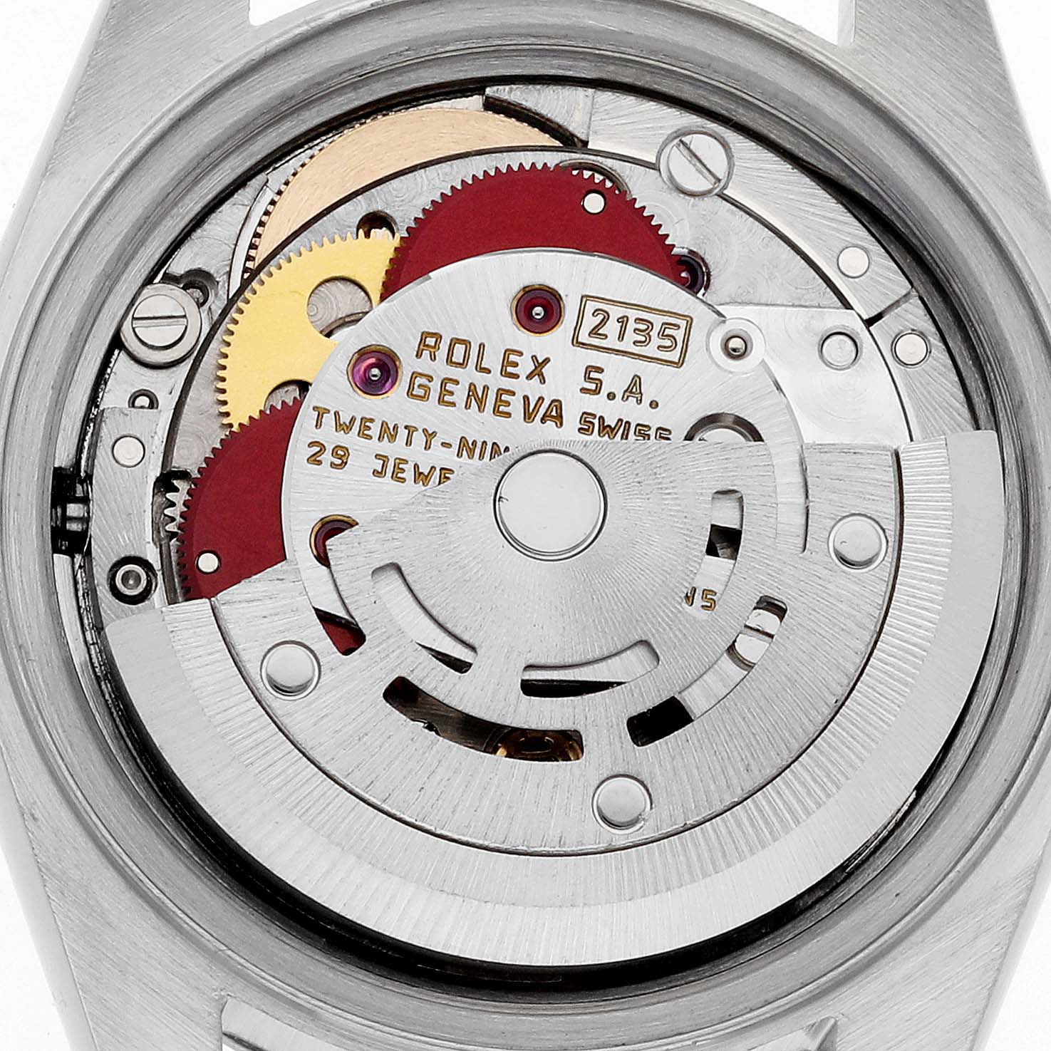 The image shows a close-up view of the Datejust model by Rolex, focusing on the watch's internal mechanism and movement parts.