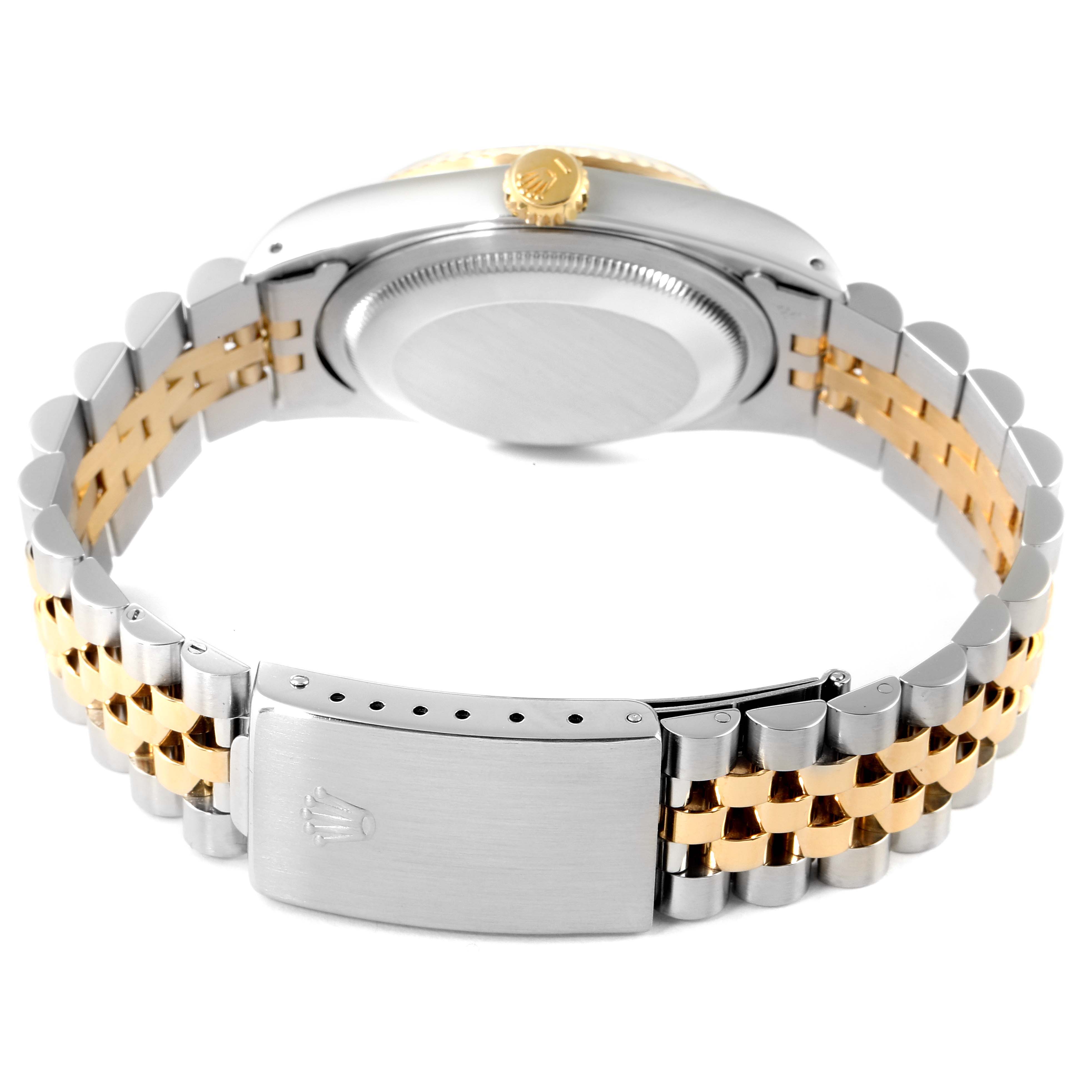 This image shows the back of a Rolex Datejust 16233 Men's Steel and Gold (two tone) Champagne Dial 16233 Men's Steel and Gold (two tone) Champagne Dial watch, highlighting its two-tone bracelet and clasp.