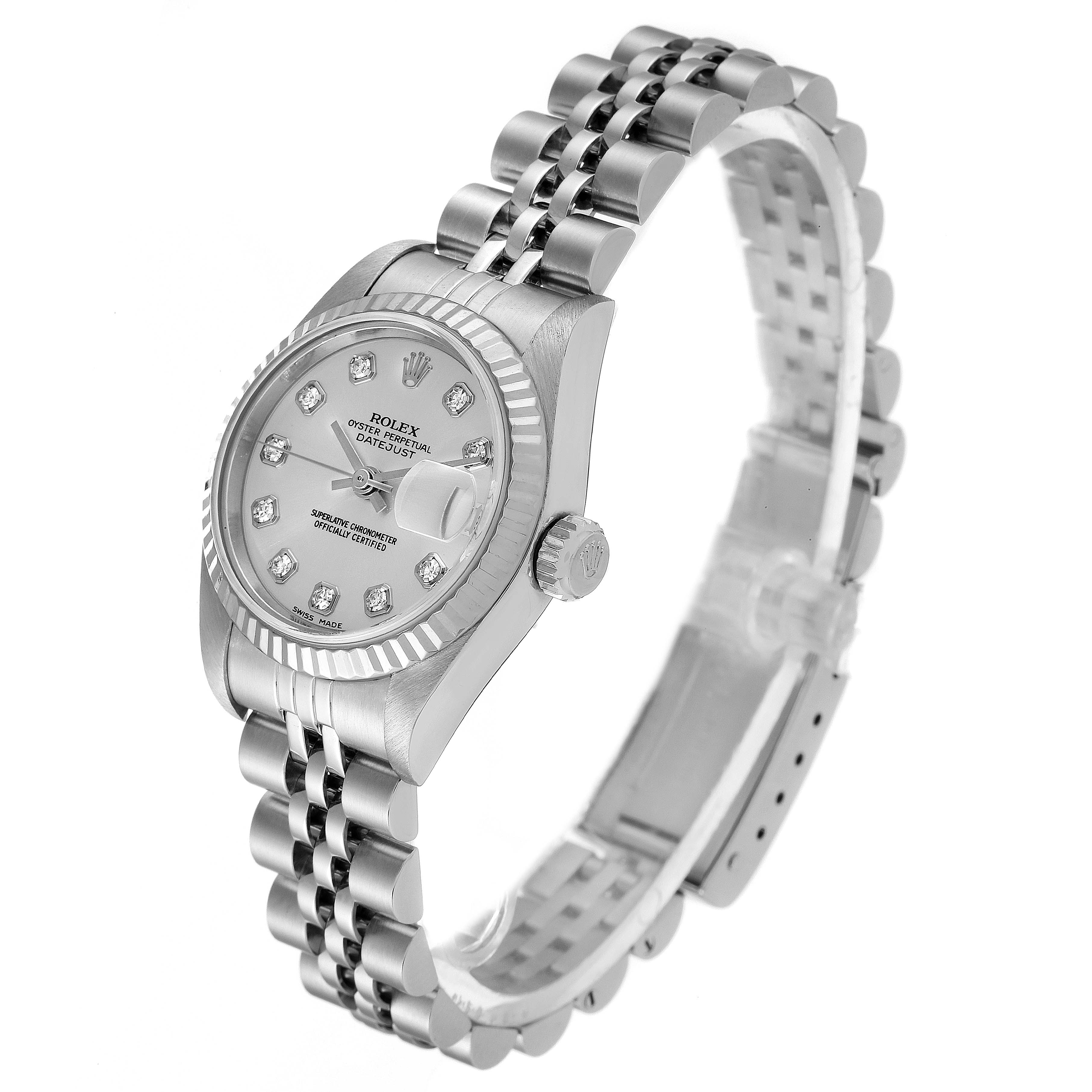 The Rolex Datejust 79174 Women
s Stainless Steel Silver Dial 79174 Women
s Stainless Steel Silver Dial watch is shown at a three-quarter angle, highlighting its bracelet, fluted bezel, and diamond hour markers.