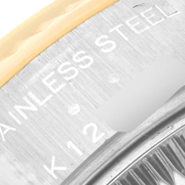 Close-up view of the side of a Rolex Datejust 79173 Women's Steel and Gold (two tone) Blue Dial 79173 Women's Steel and Gold (two tone) Blue Dial watch, showing the stainless steel and gold bezel.