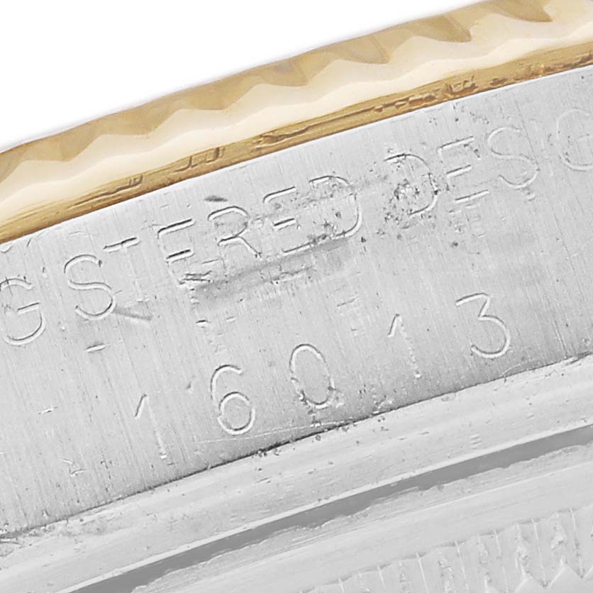 Close-up angle of the case and the model number engraving on a Rolex Vintage Collection 16013 Men's Steel and Gold (two tone) White Dial 16013 Men's Steel and Gold (two tone) White Dial watch.