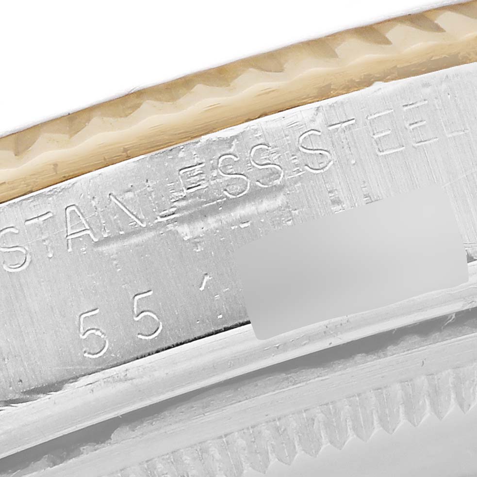 The image shows a close-up of the stainless steel case side and bezel of a Rolex Vintage Collection 16013 Men's Steel and Gold (two tone) White Dial 16013 Men's Steel and Gold (two tone) White Dial watch.