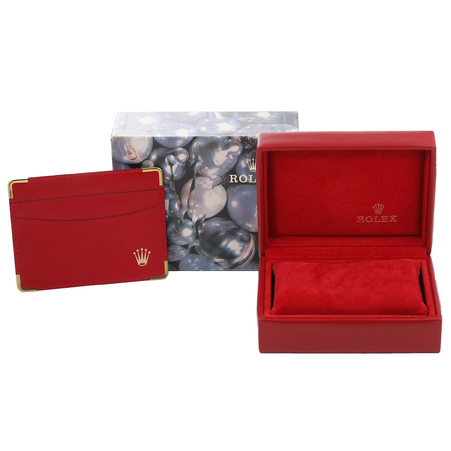 The image shows an open Rolex Datejust 79173 Women's Steel and Gold (two tone) Champagne Dial 79173 Women's Steel and Gold (two tone) Champagne Dial watch box, a cardholder, and a decorative box.