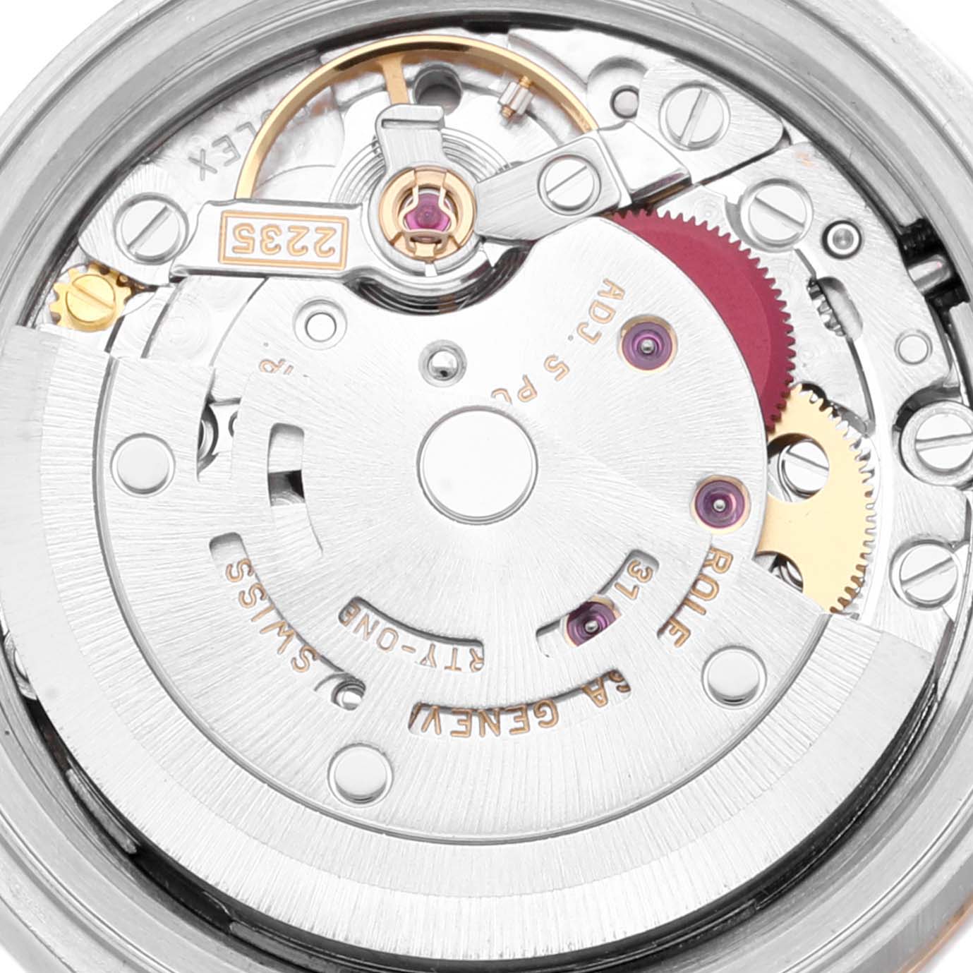 This is an internal close-up view of the Rolex Datejust 79173 Women's Steel and Gold (two tone) Champagne Dial 79173 Women's Steel and Gold (two tone) Champagne Dial's movement and mechanical components.