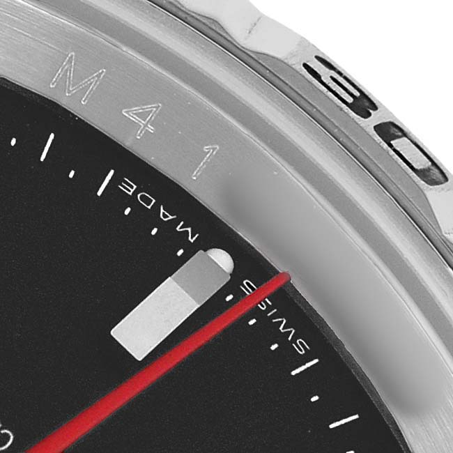 The image shows a close-up of the bezel and part of the dial of a Rolex Datejust 116264 Men's Stainless Steel Black Dial watch, highlighting the markers and text details.
