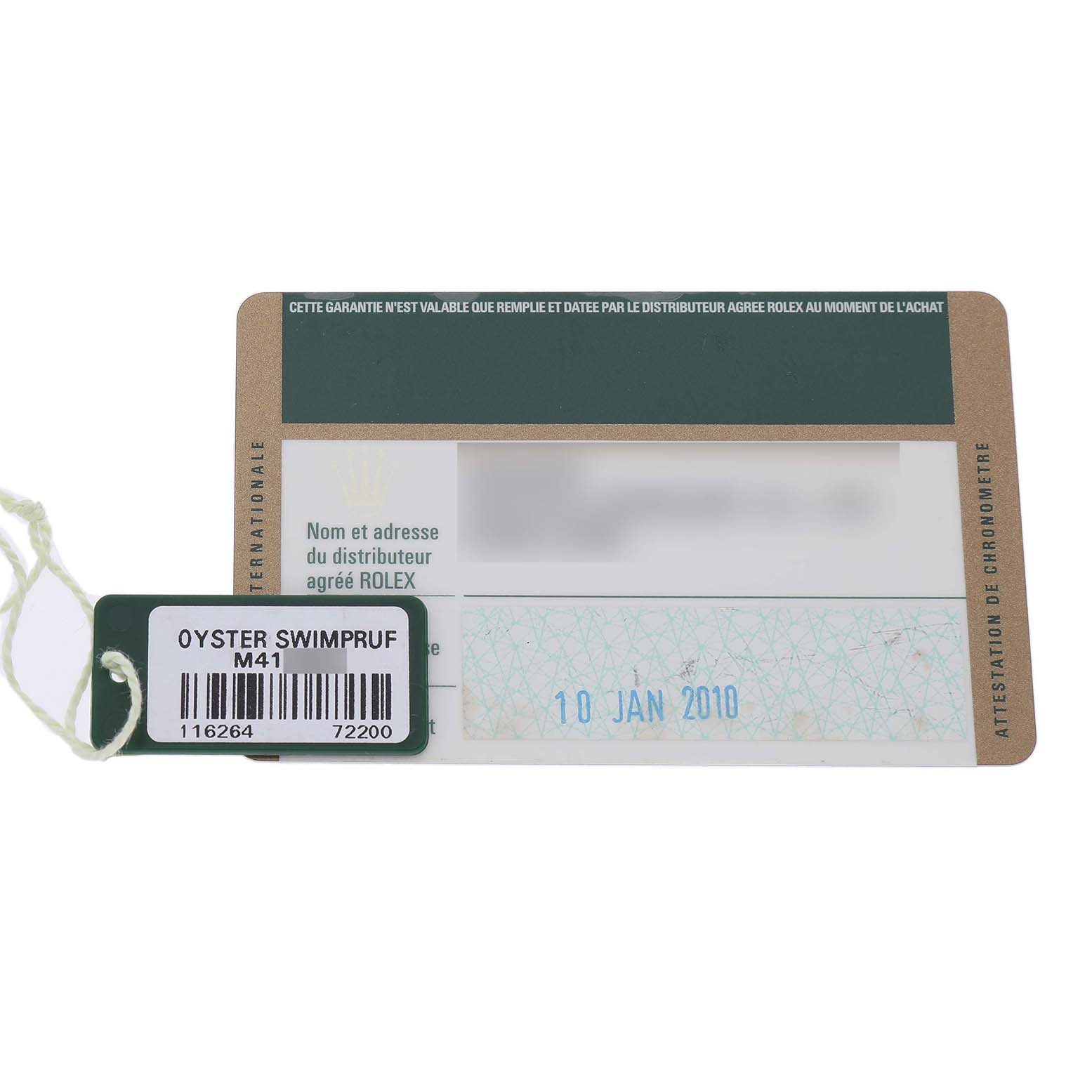 The image shows a warranty card and tag for a Rolex Datejust 116264 Men's Stainless Steel Black Dial, featuring some text and a barcode.