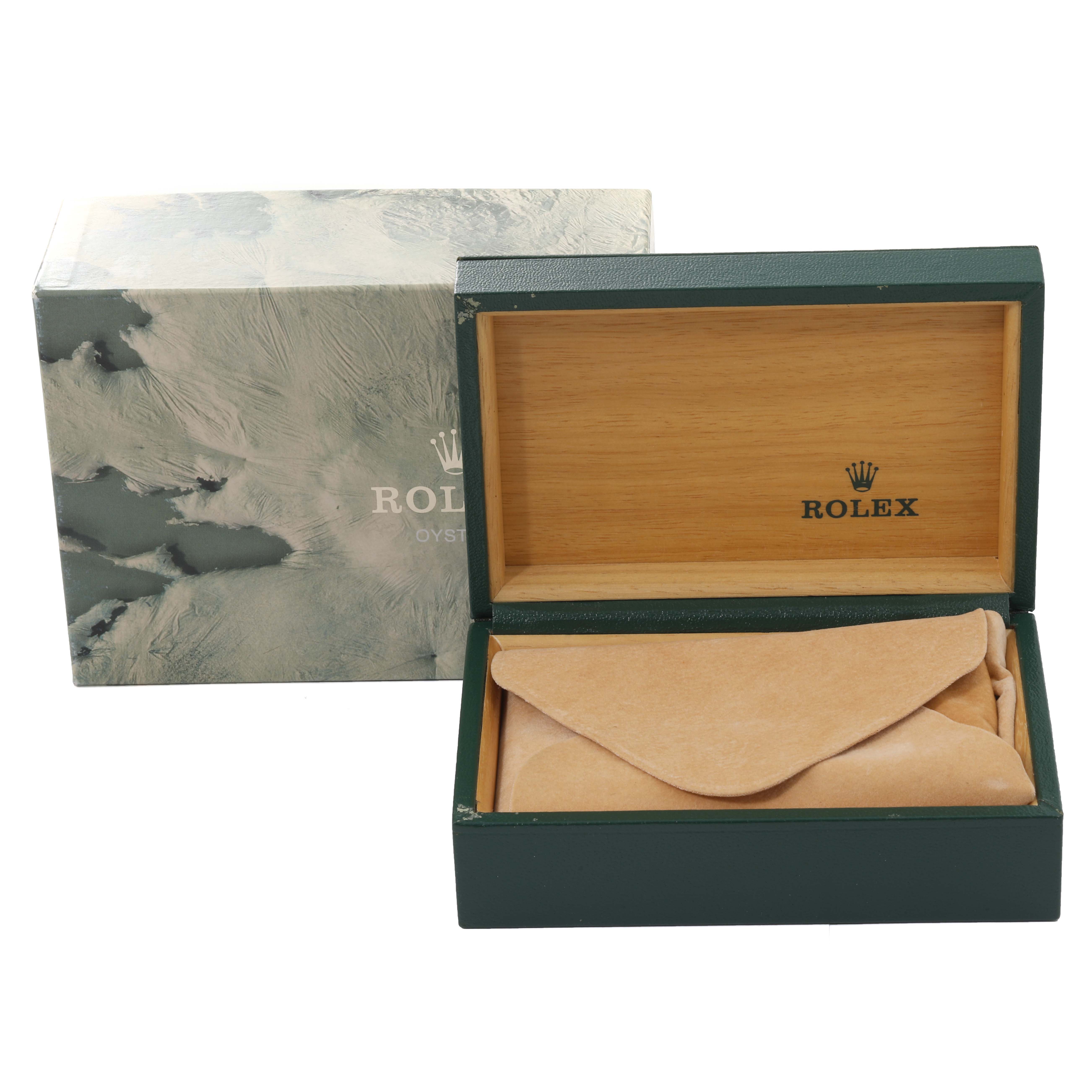The image shows an open Rolex Vintage Collection 16014 Men's Stainless Steel Blue Dial 16014 Men's Stainless Steel Blue Dial watch box with a paper envelope inside and an outer marble-patterned box.