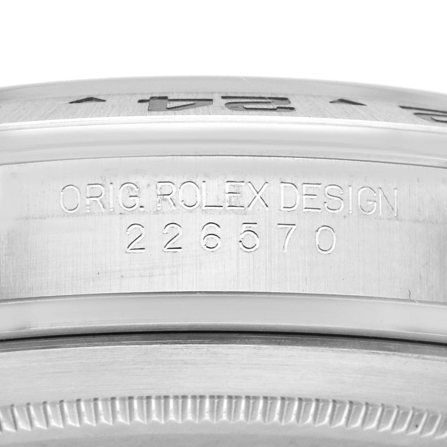 This image shows a close-up of the side of the bezel and casing with engravings on the Rolex Explorer 226570 Men's Stainless Steel White Dial 226570 Men's Stainless Steel White Dial model.