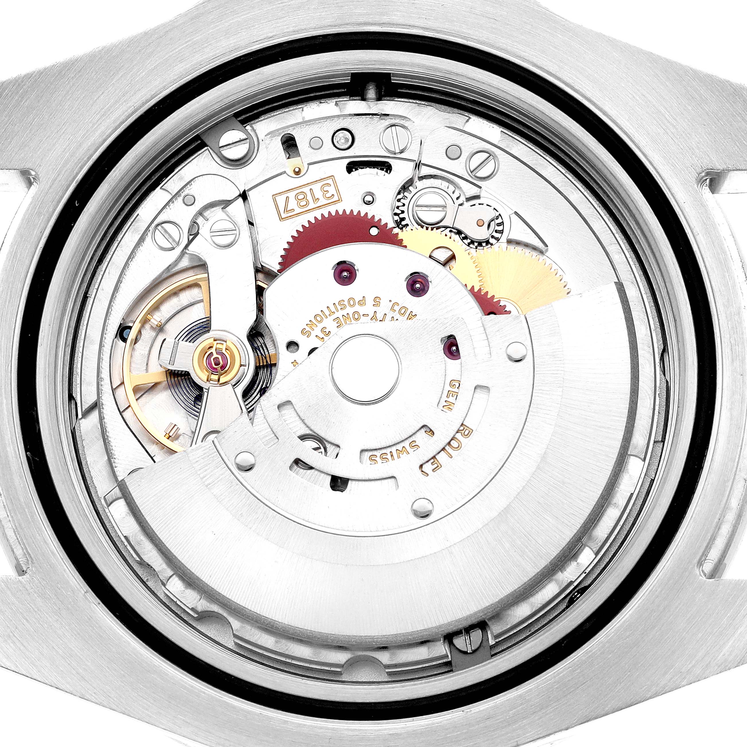 The image shows a detailed view of the movement inside the Rolex Explorer model 216570 men
s watch, including gears and mechanical components.