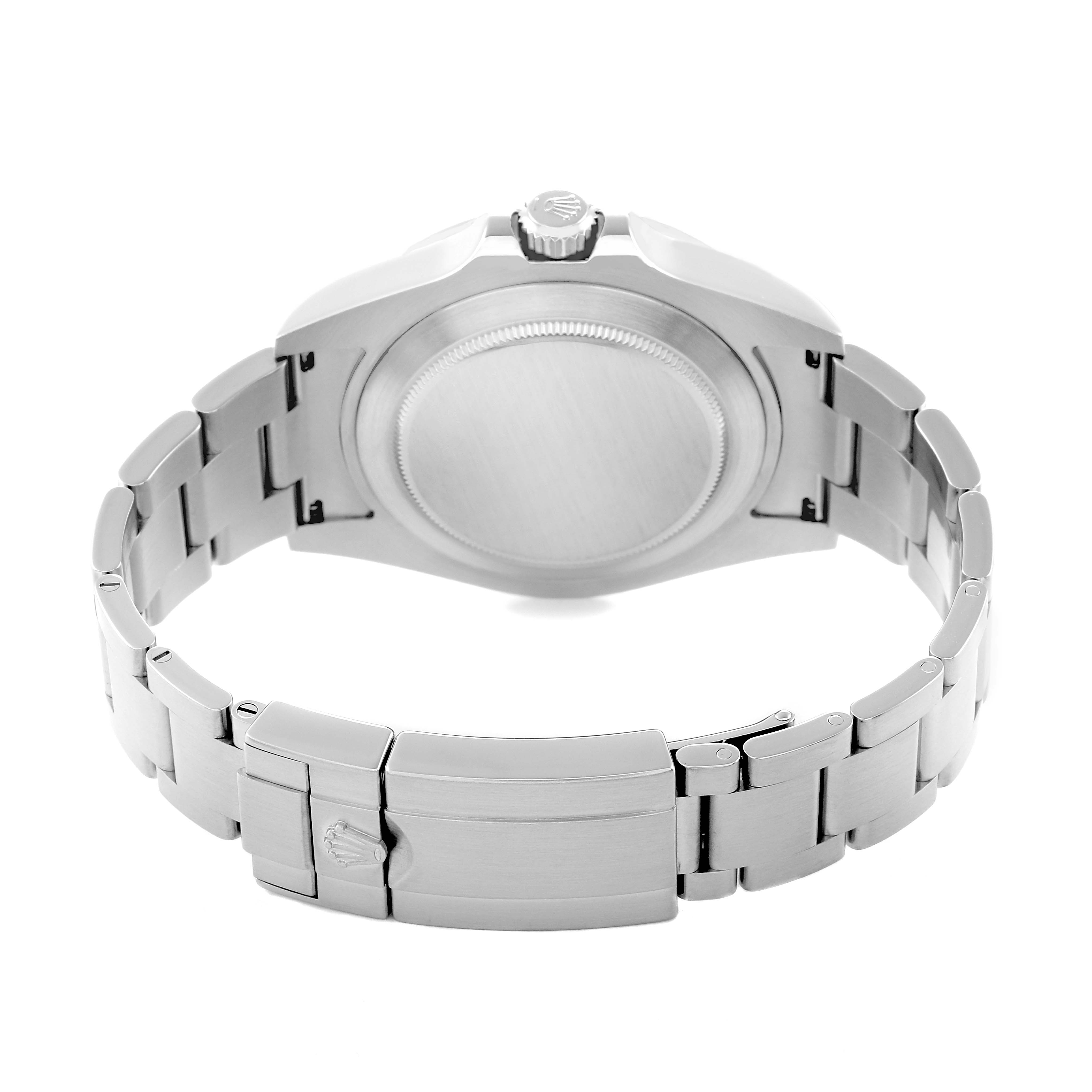 The image shows the back of the Rolex Explorer model 216570, displaying its case, bracelet, and clasp from a rear angle.